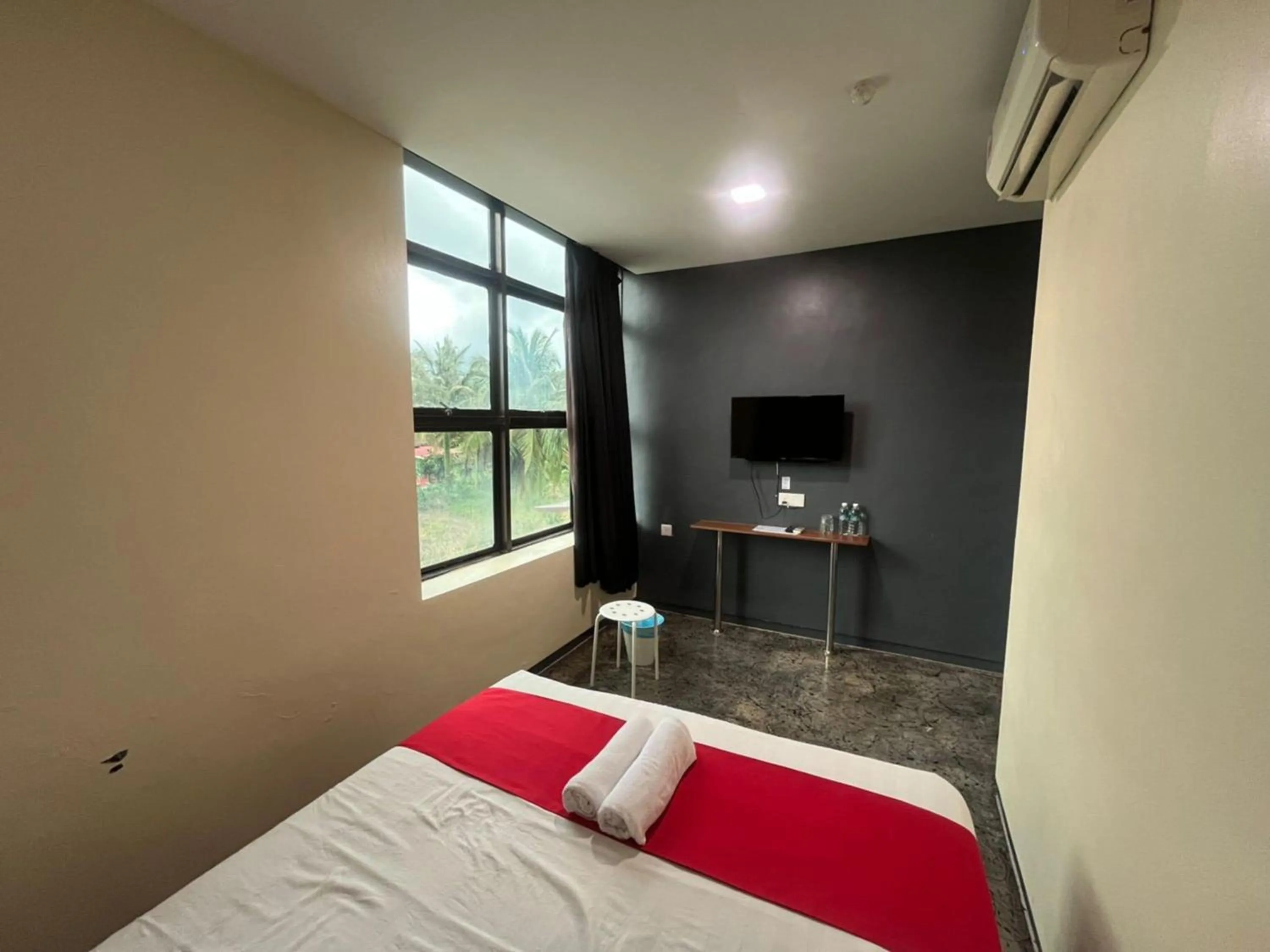 Bedroom in Capital O 89333 Musse Hotel