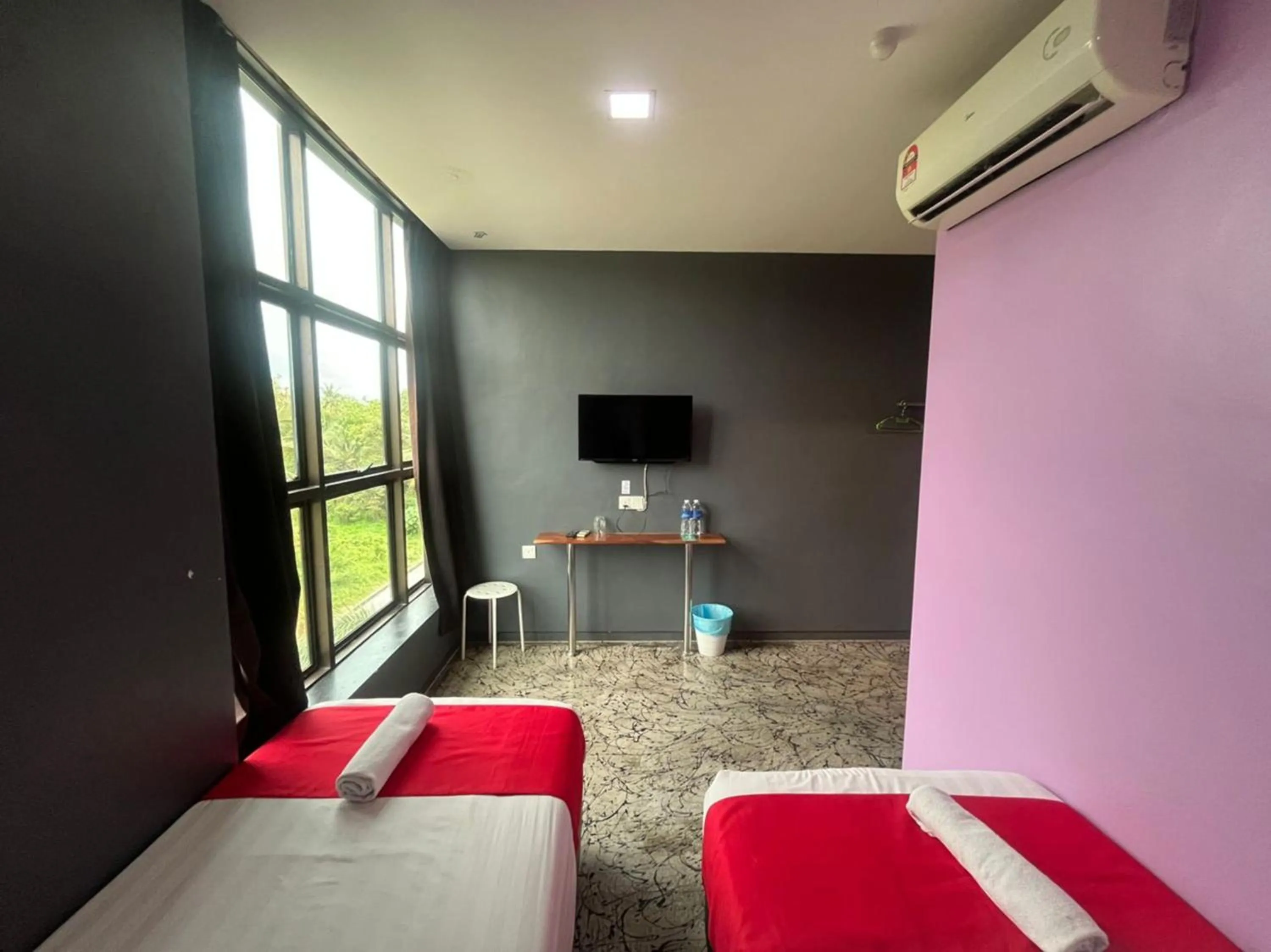 Bedroom in Capital O 89333 Musse Hotel