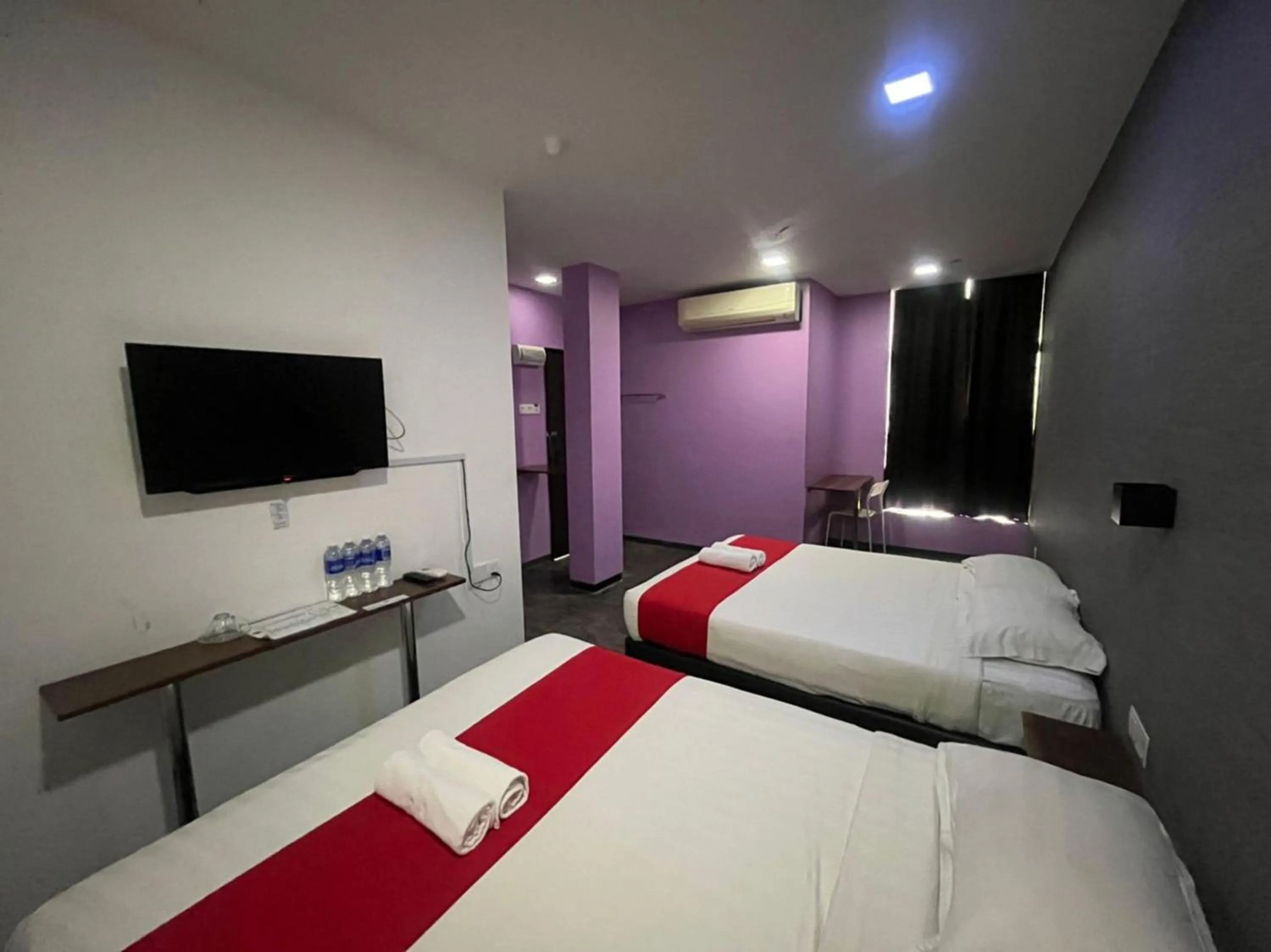 Bedroom in Capital O 89333 Musse Hotel