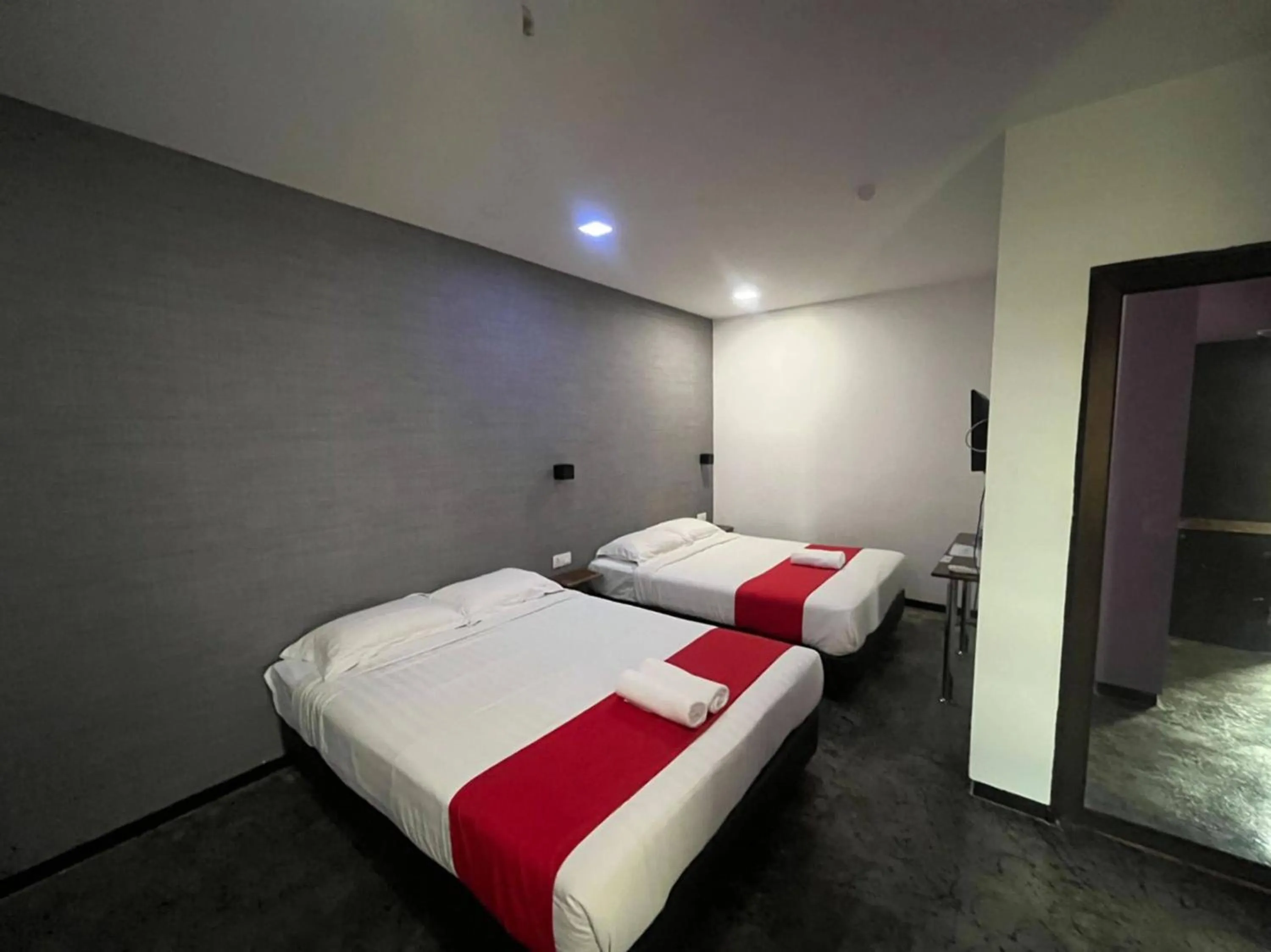 Bedroom in Capital O 89333 Musse Hotel