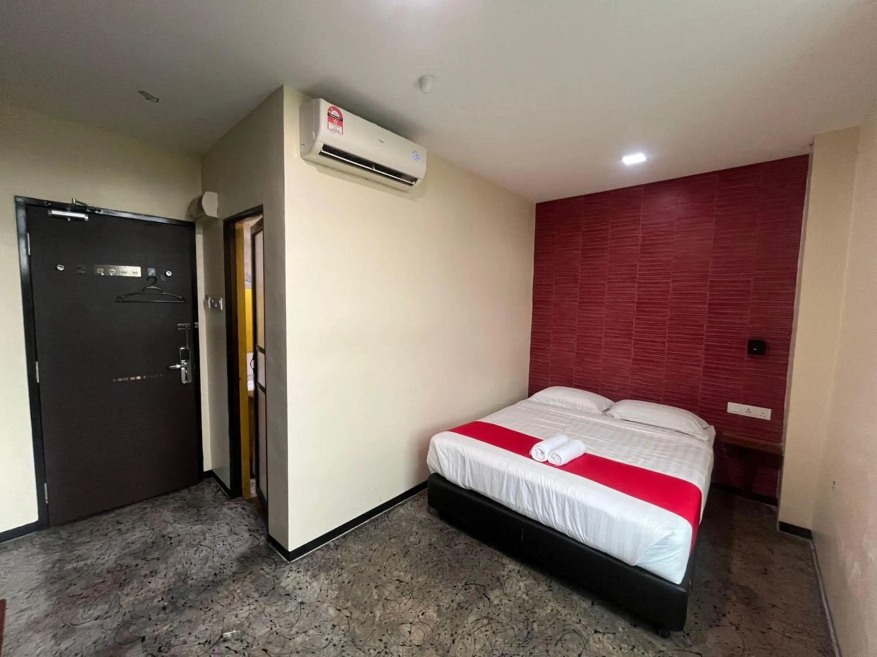 Bedroom in Capital O 89333 Musse Hotel