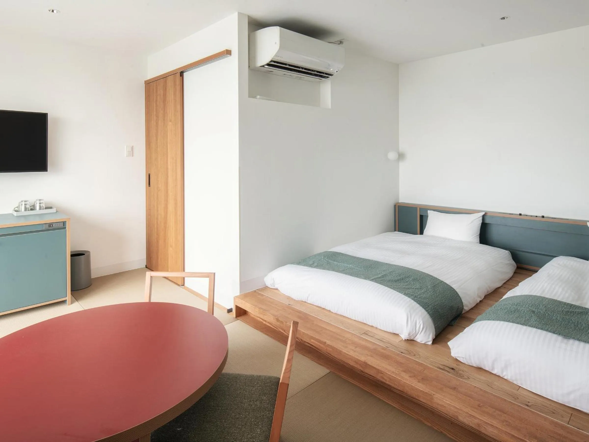 Bed in REF Okinawa Arena by VESSEL HOTELS