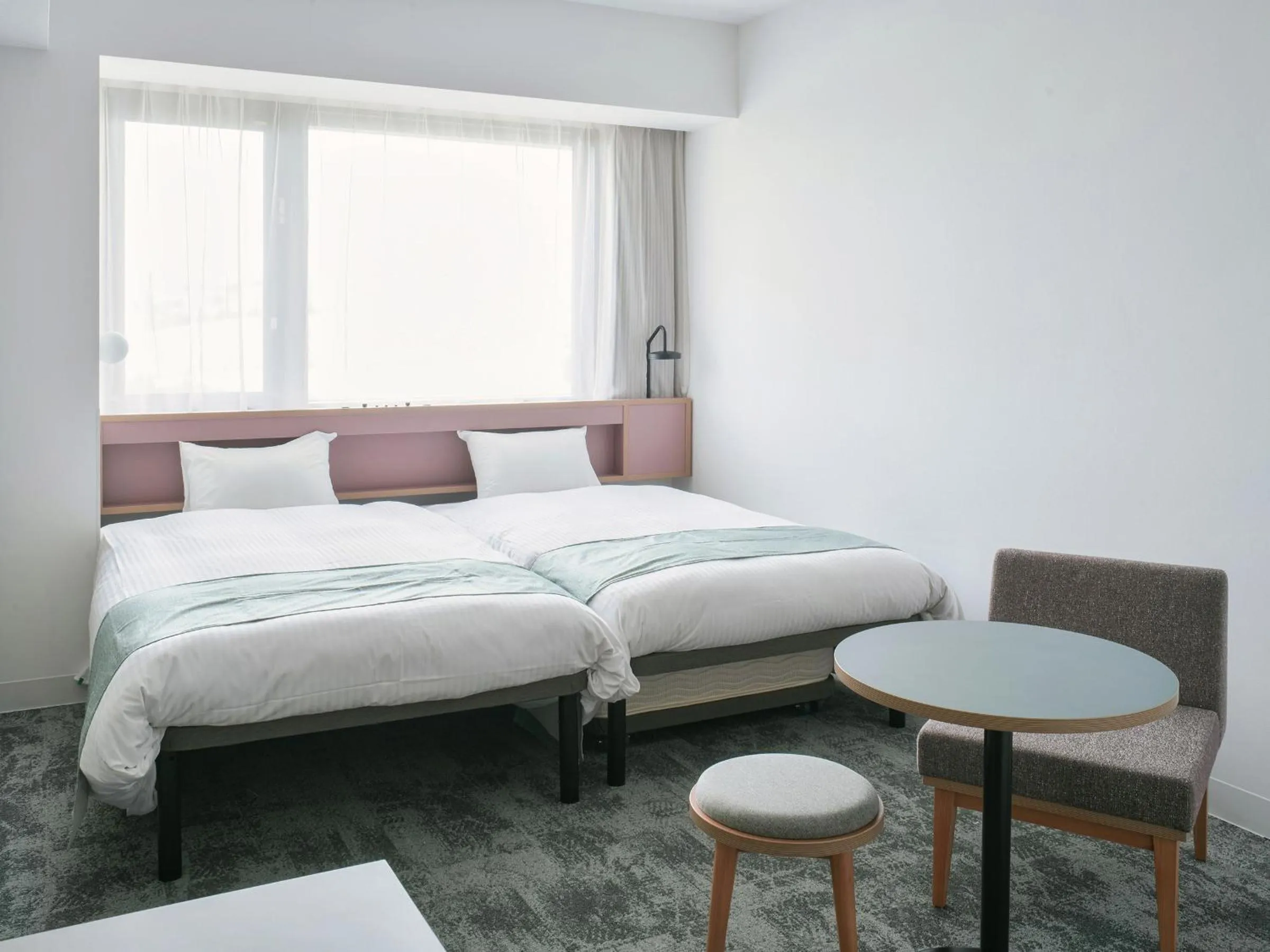 Bed in REF Okinawa Arena by VESSEL HOTELS