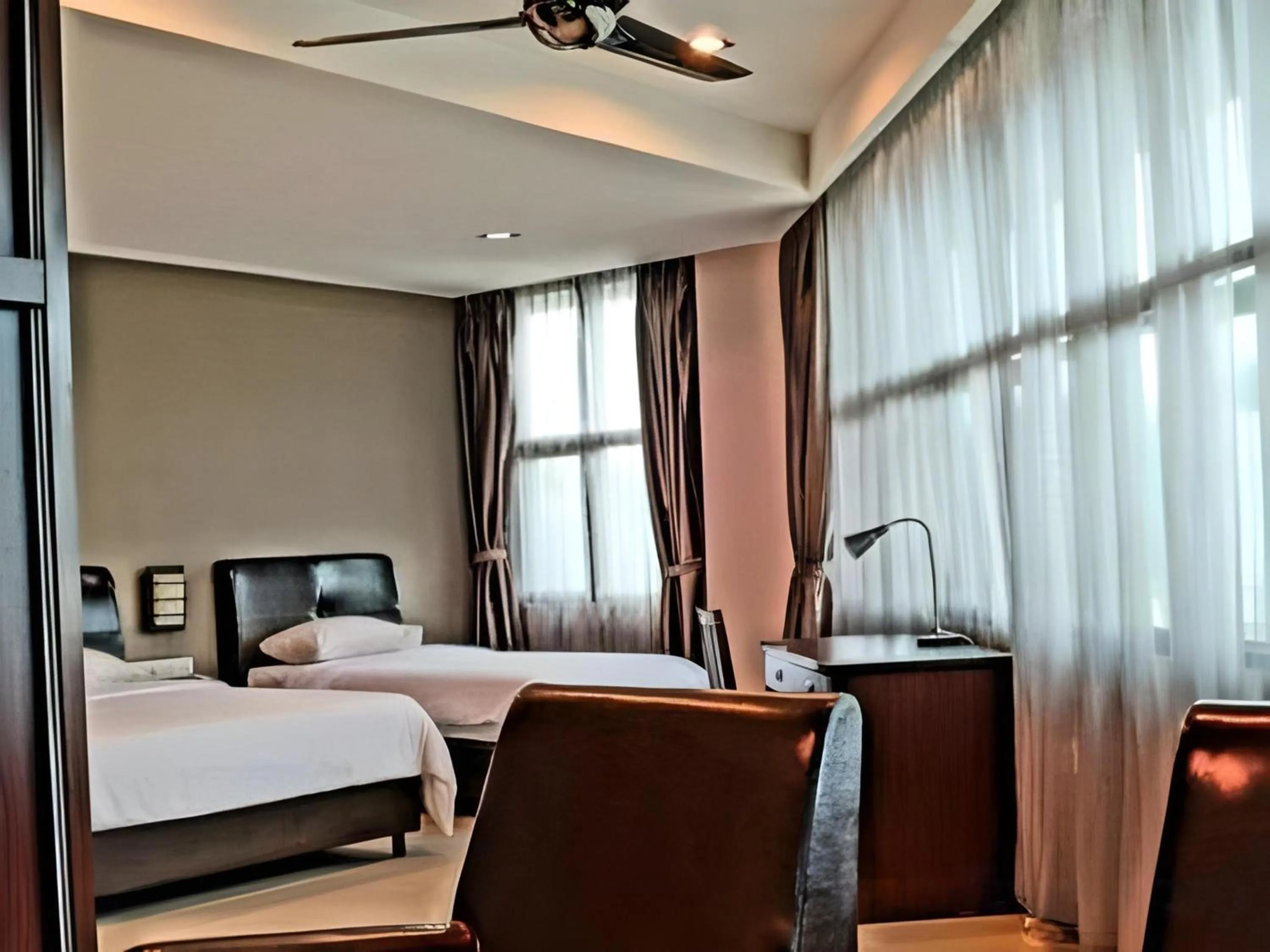 Photo of the whole room, Bed in Capital O Rail Hotel