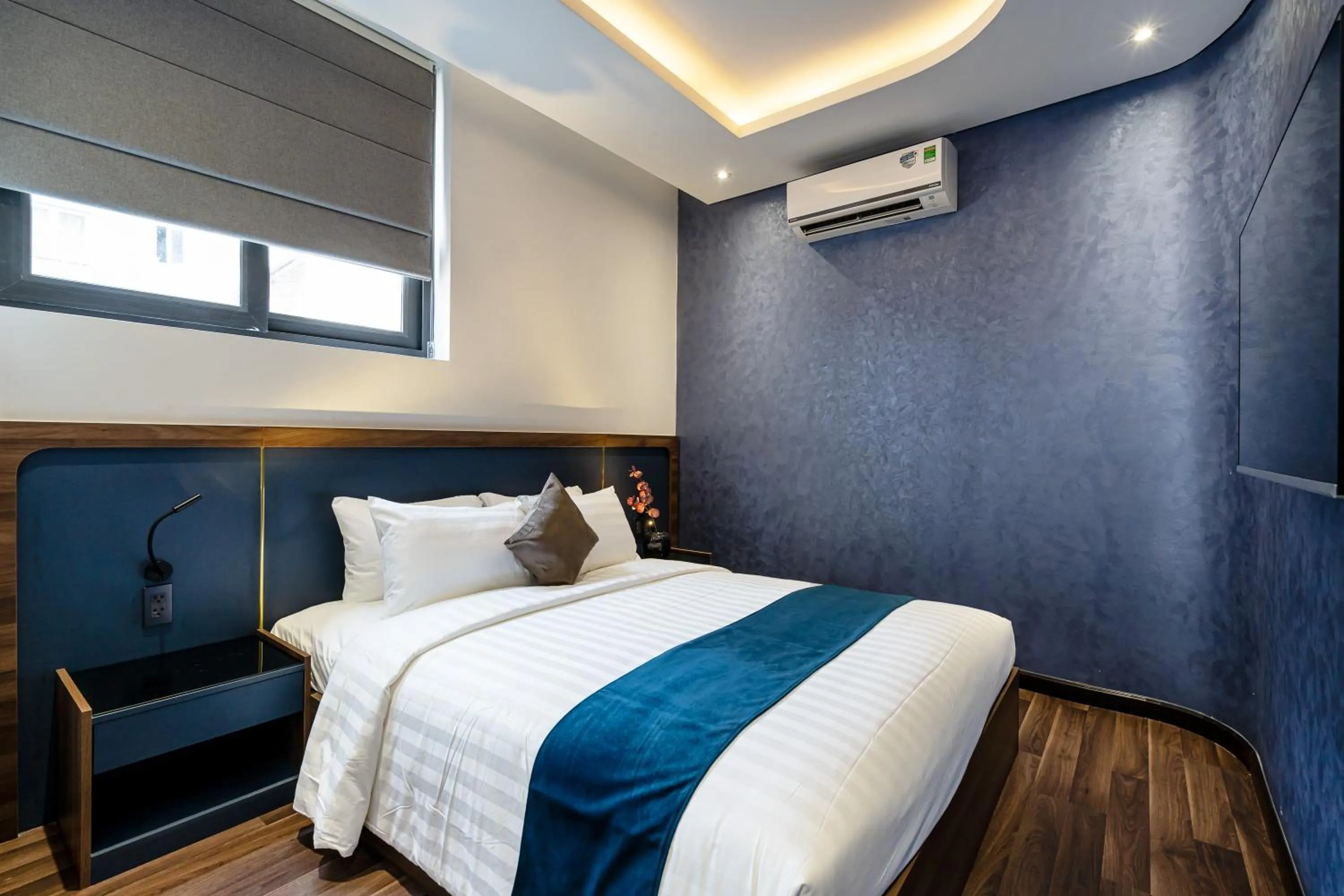 Bed in KunKin Garden Aparthotel