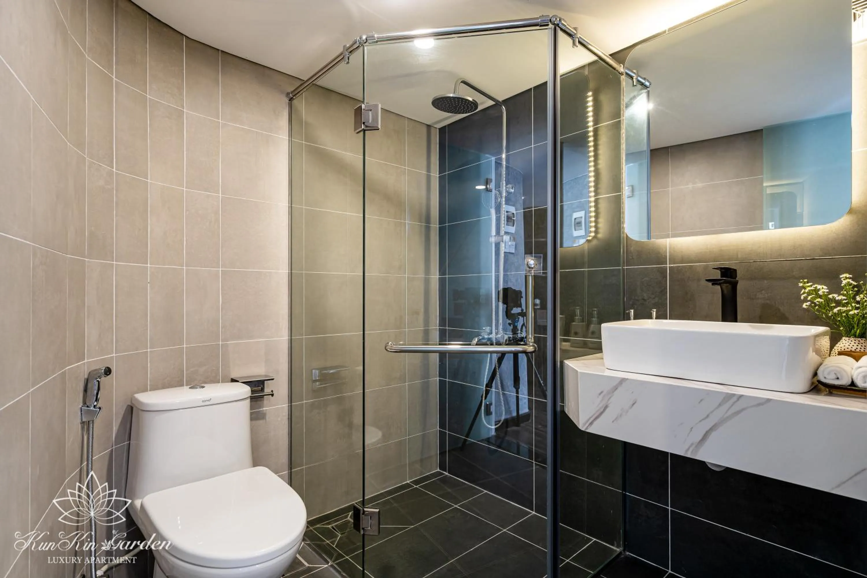 Shower in KunKin Garden Aparthotel