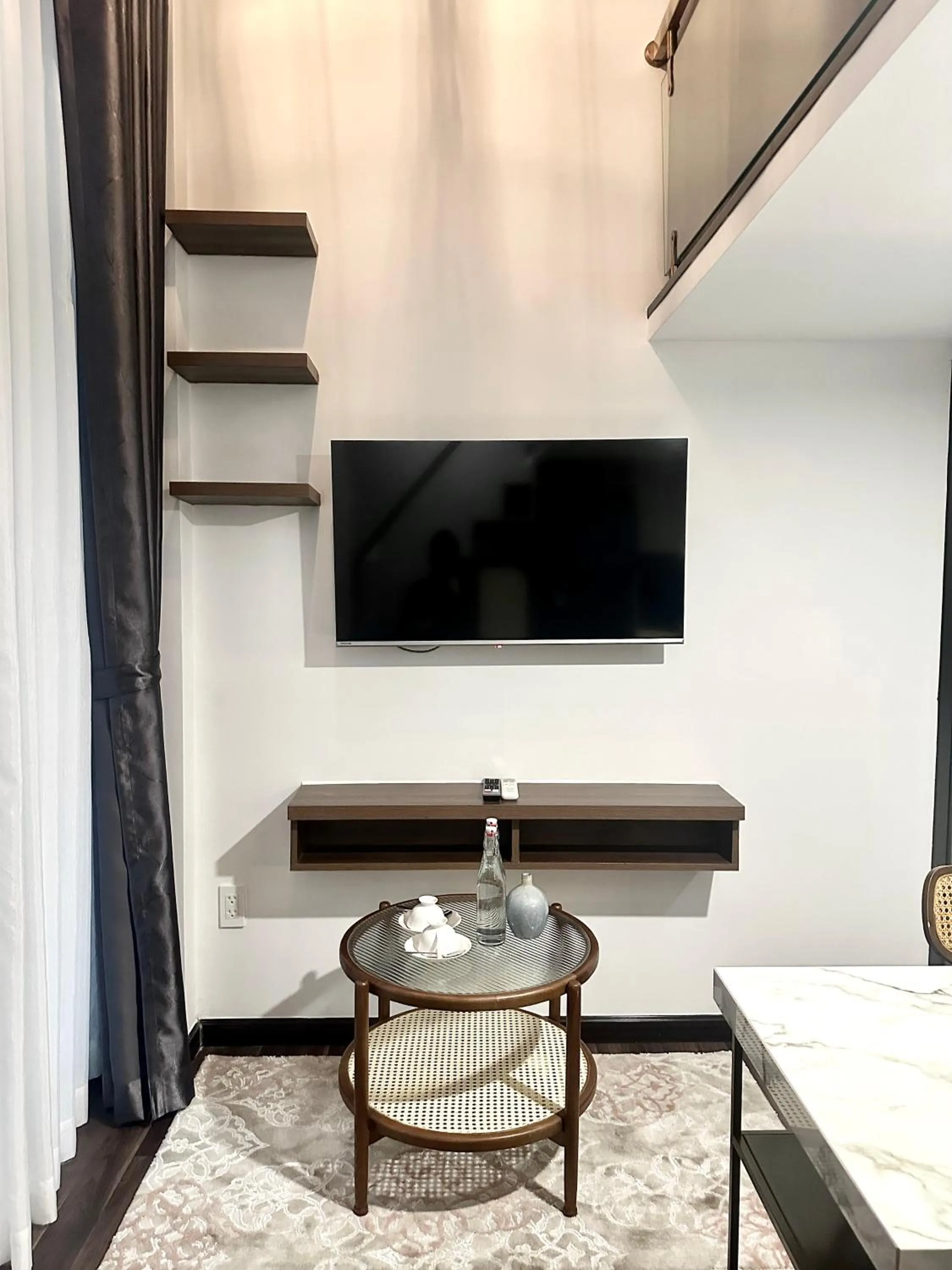 Communal lounge/ TV room in KunKin Garden Aparthotel