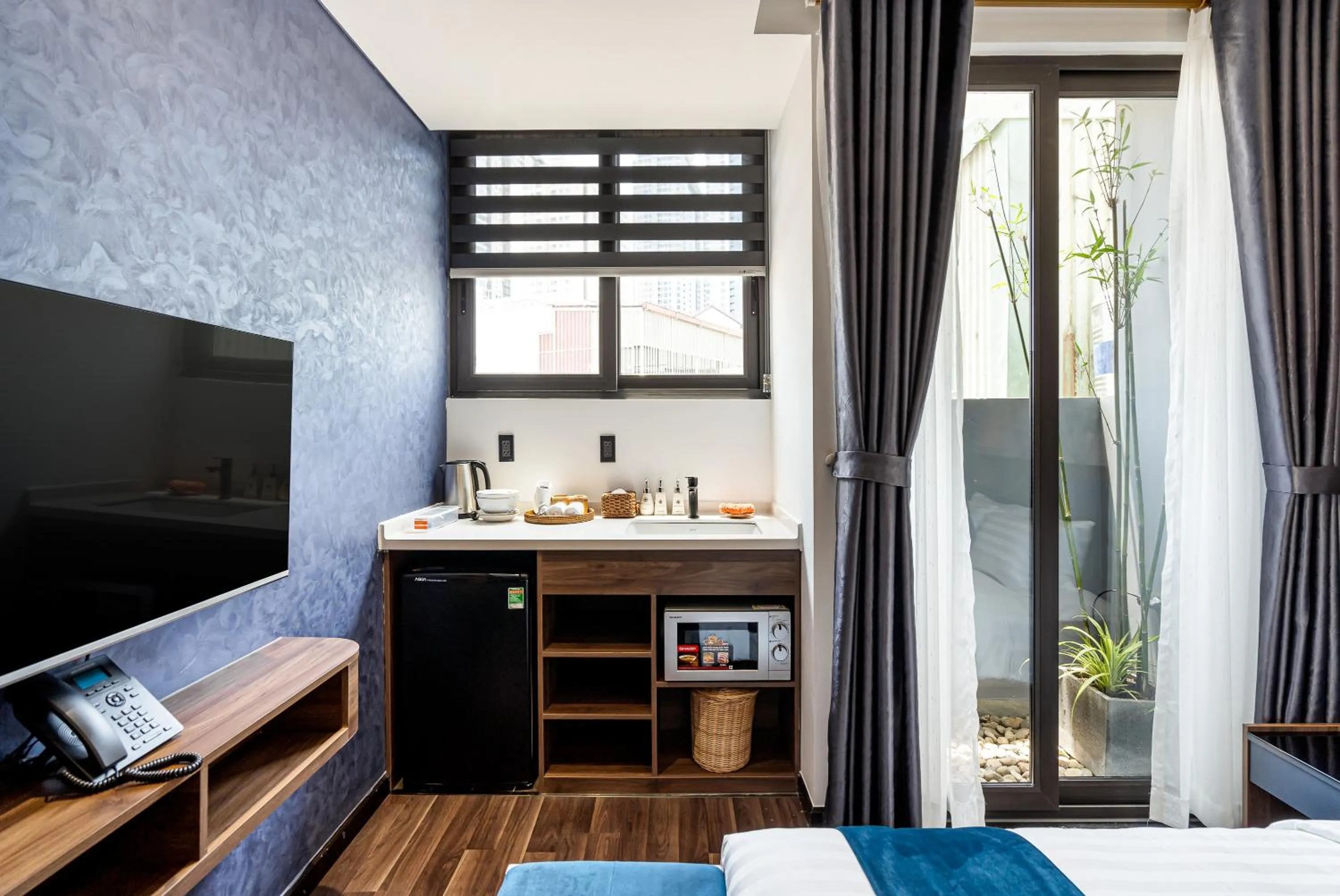 Bed in KunKin Garden Aparthotel