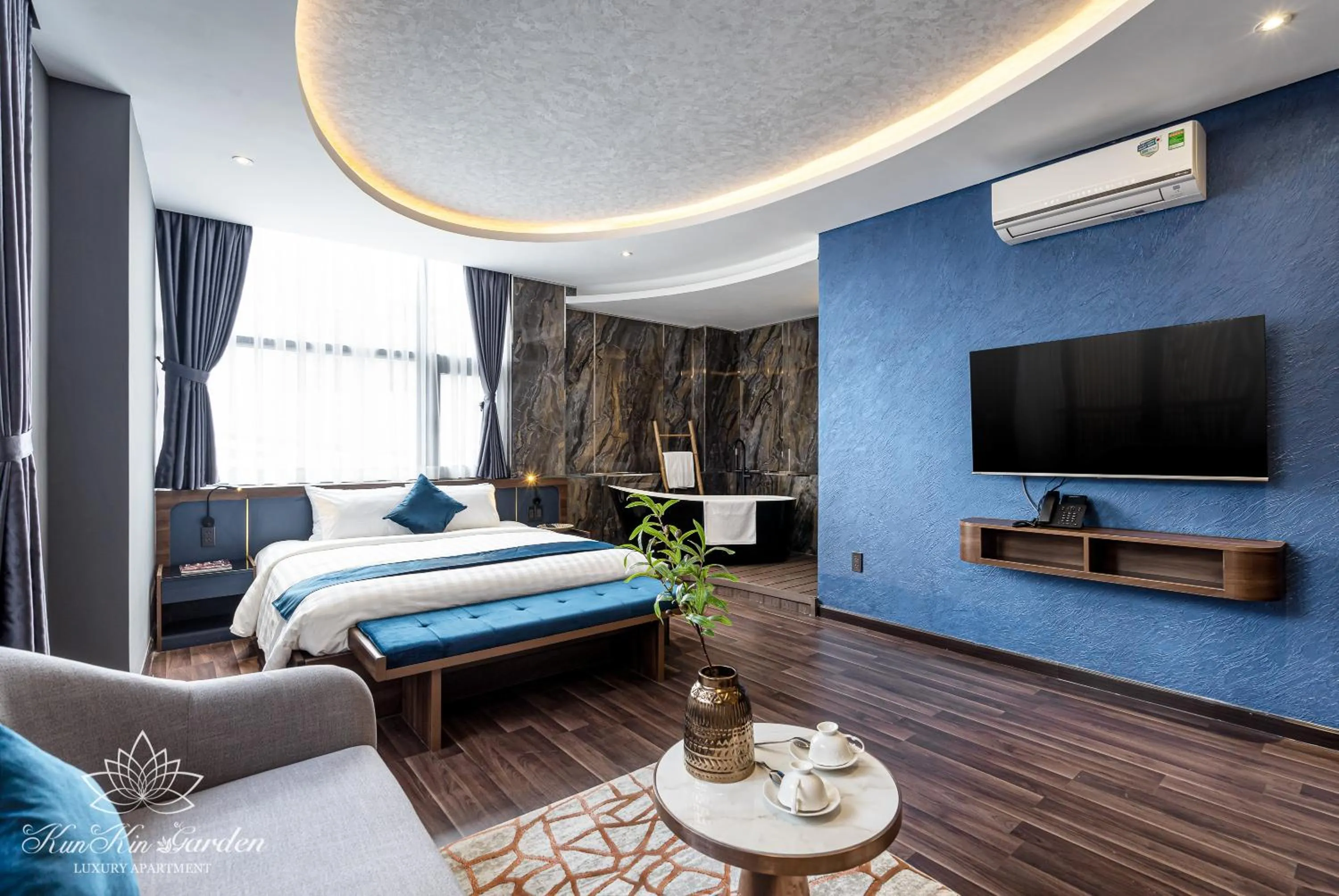 Living room, Bed in KunKin Garden Aparthotel