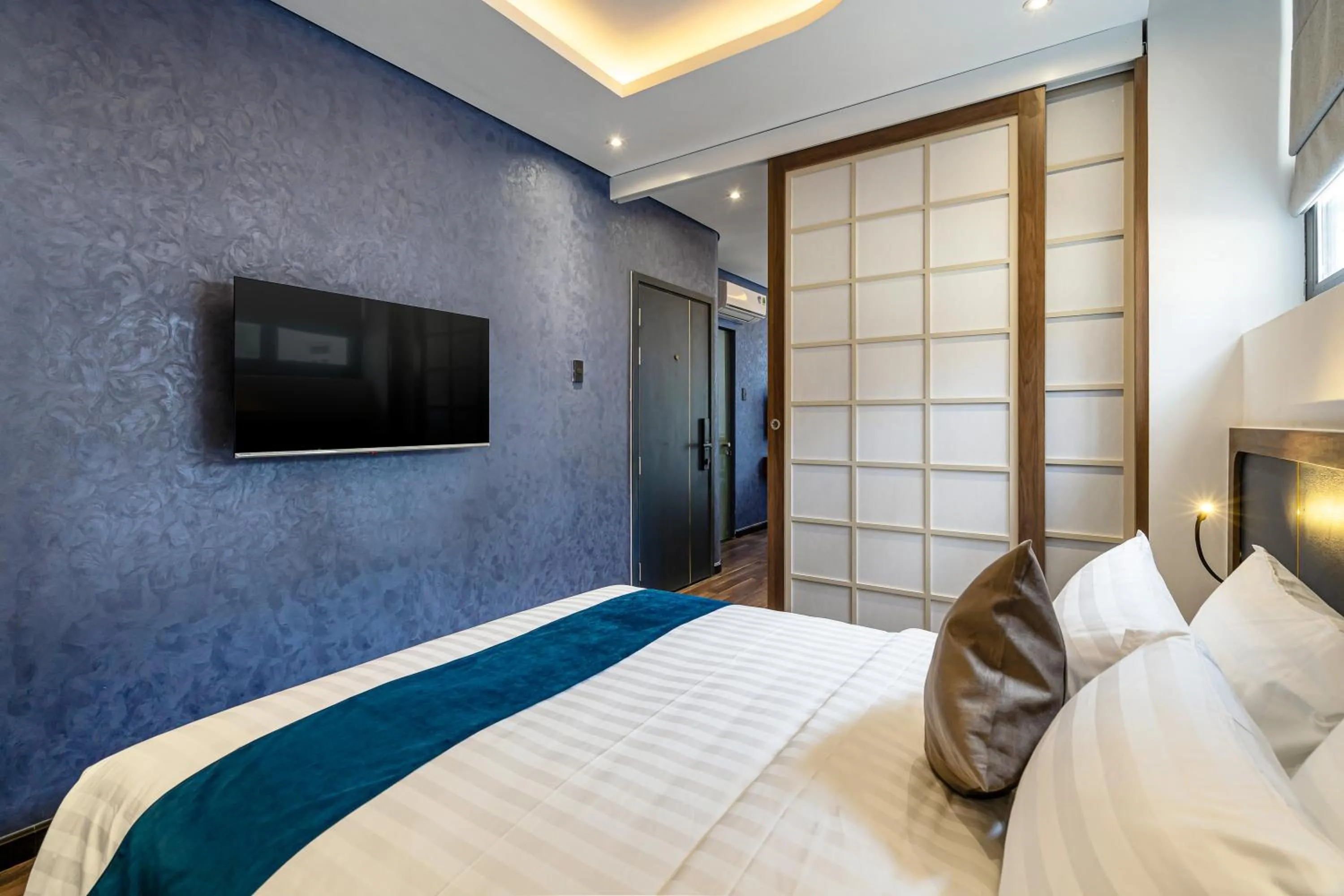 Bed in KunKin Garden Aparthotel