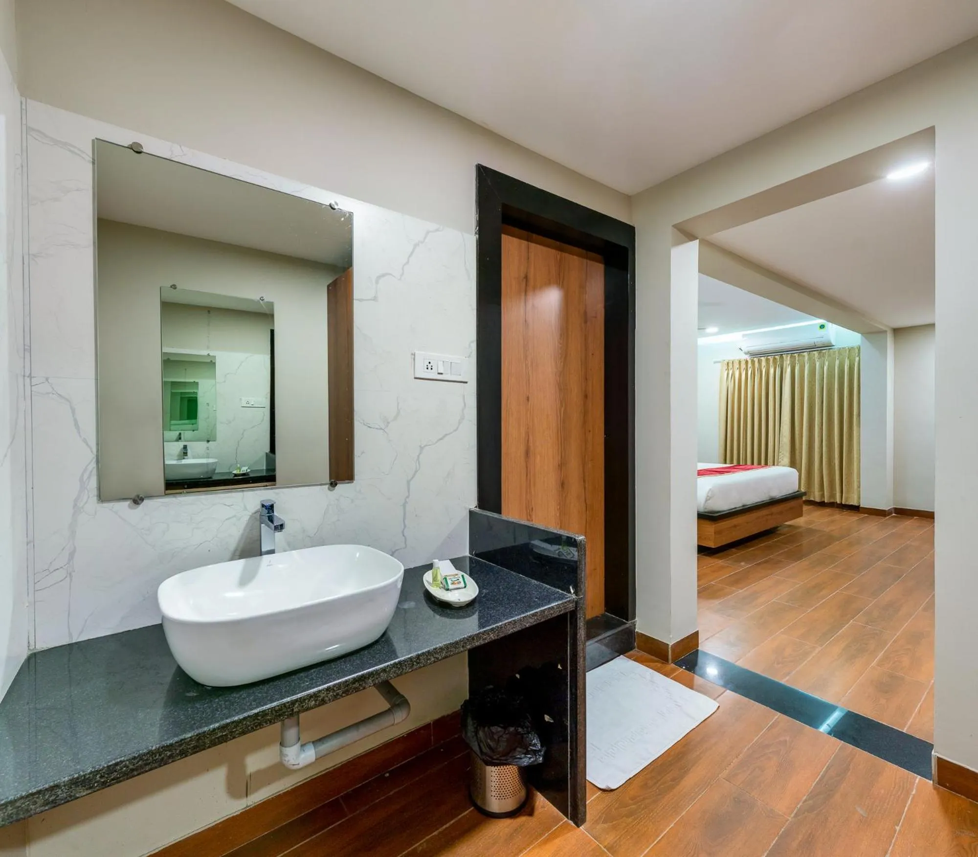 Bathroom, Bed in VOV Hotels Vijayapura