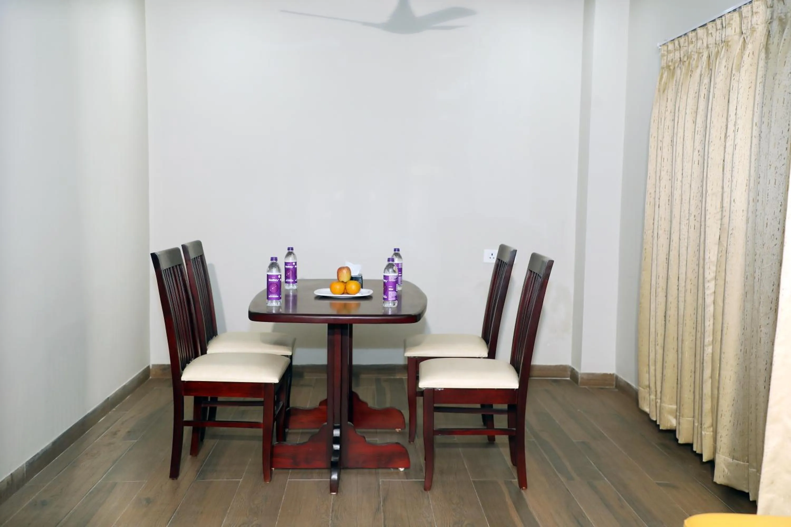 Dining area in VOV Hotels Vijayapura