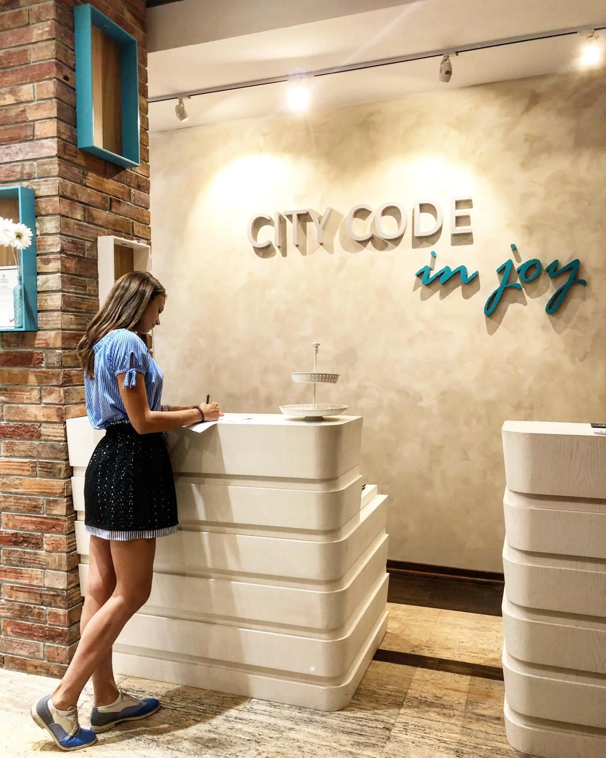 Property logo or sign in City Code In Joy