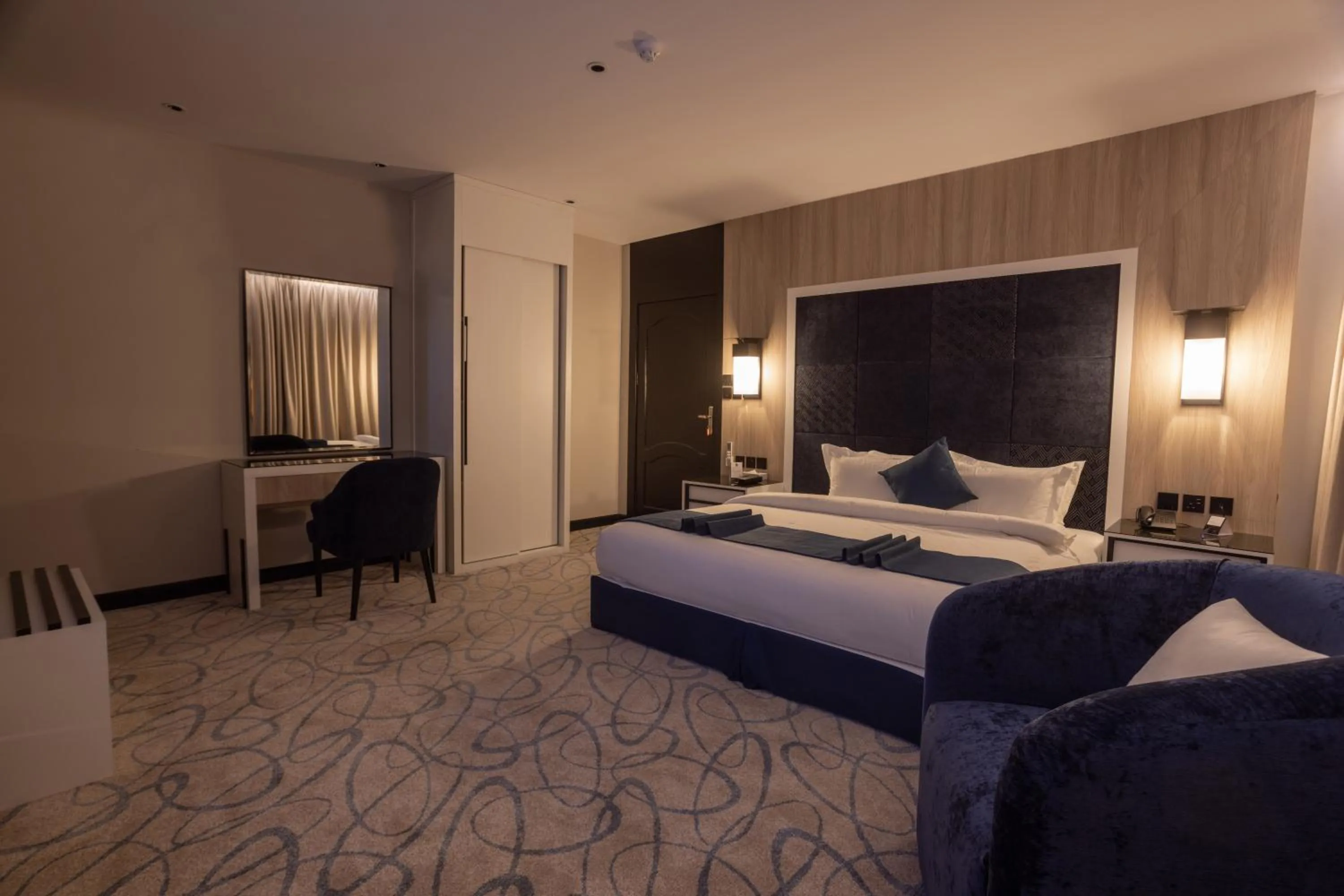 Bed in Skyline Hotel & Suites