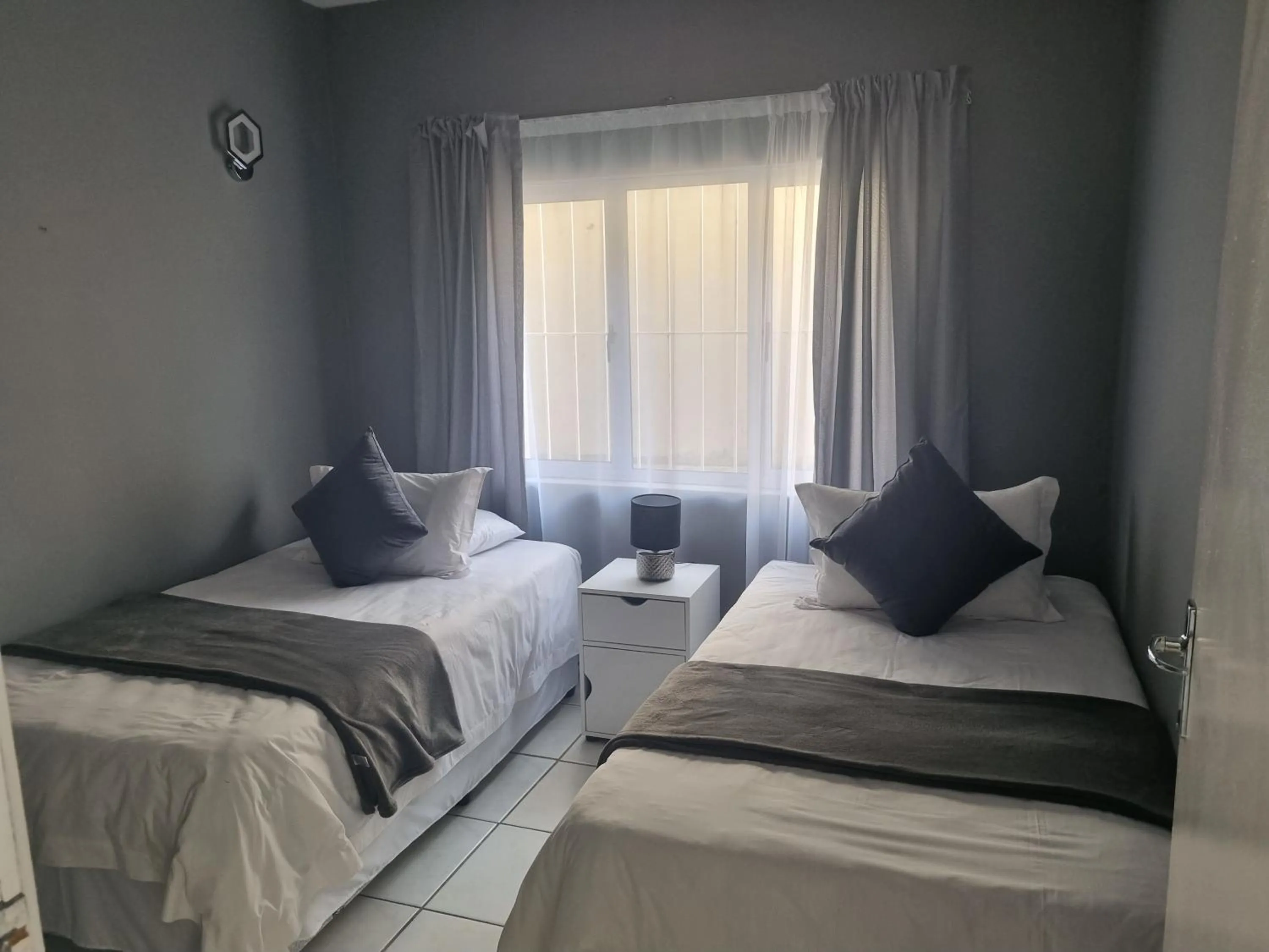 Bed in Ingwe Manor Guesthouse