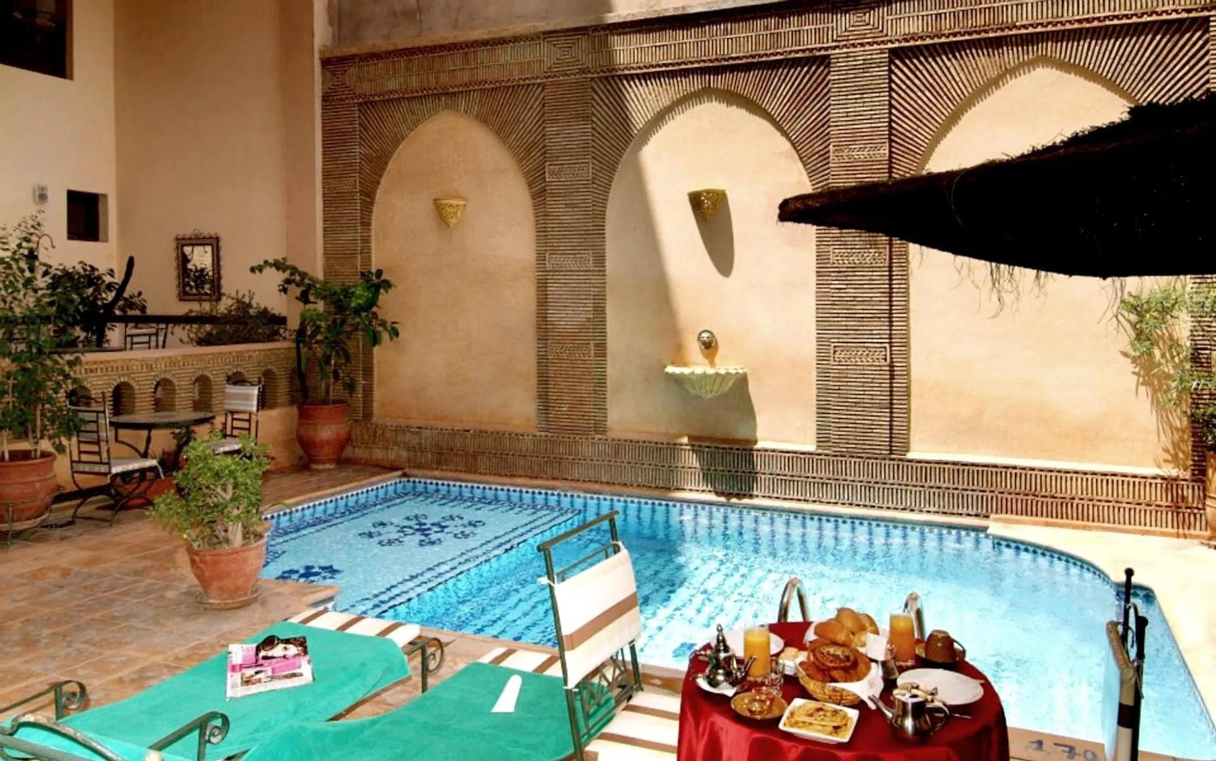 Swimming pool in Amani Hotel Suites & Spa