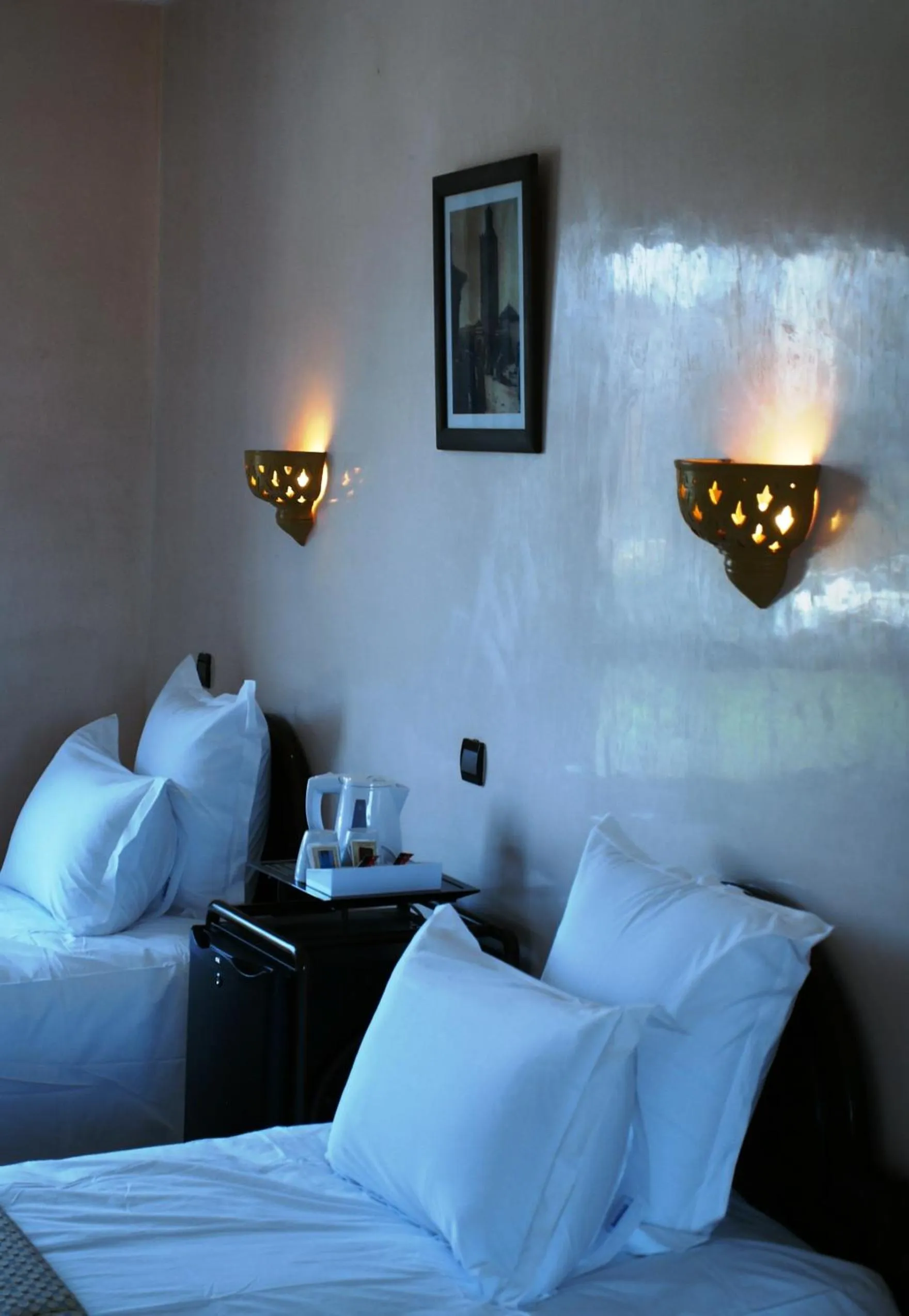 Bed in Amani Hotel Suites & Spa