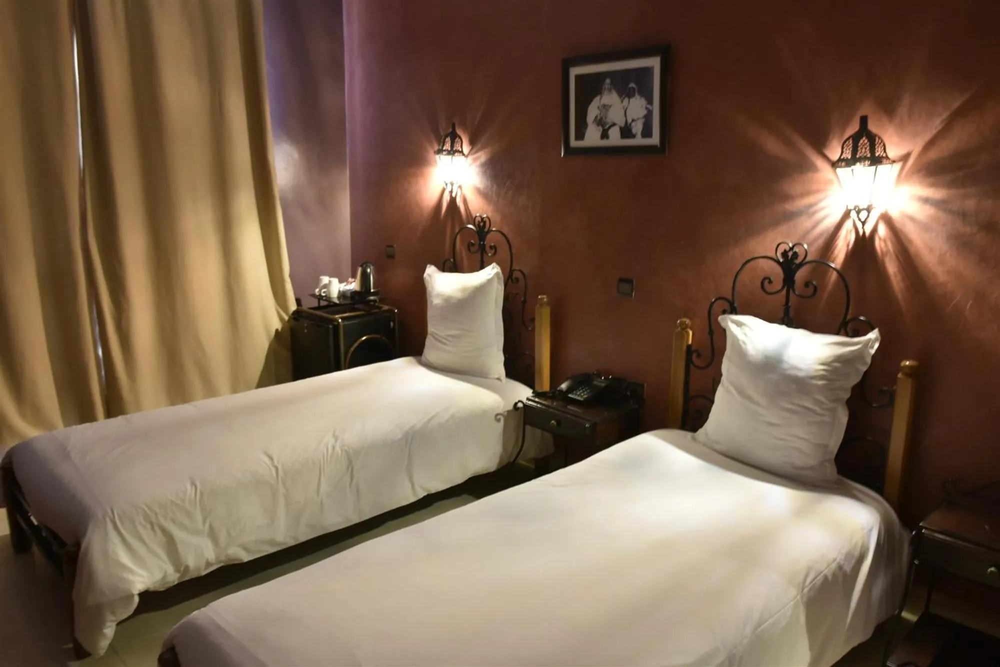 Bed in Amani Hotel Suites & Spa