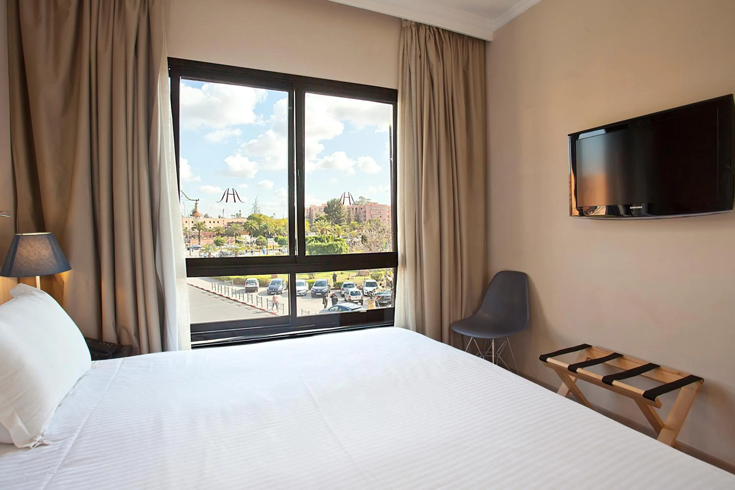 Bed in Amani Hotel Suites & Spa