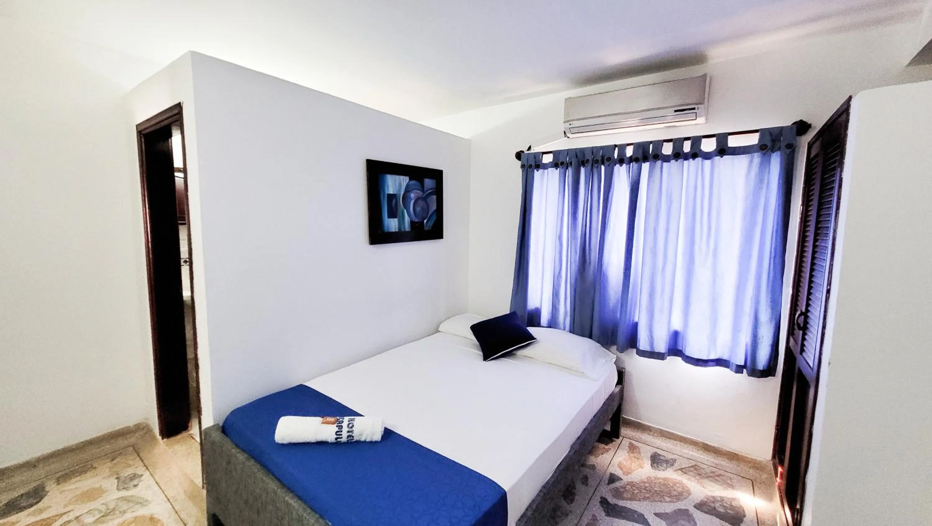 TV and multimedia, Bed in Hotel Acapulco Caucasia