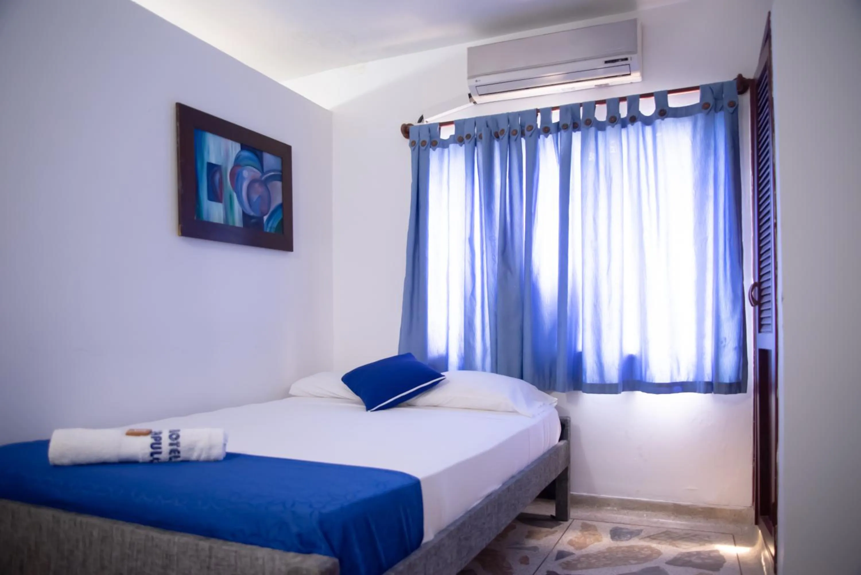 TV and multimedia, Bed in Hotel Acapulco Caucasia