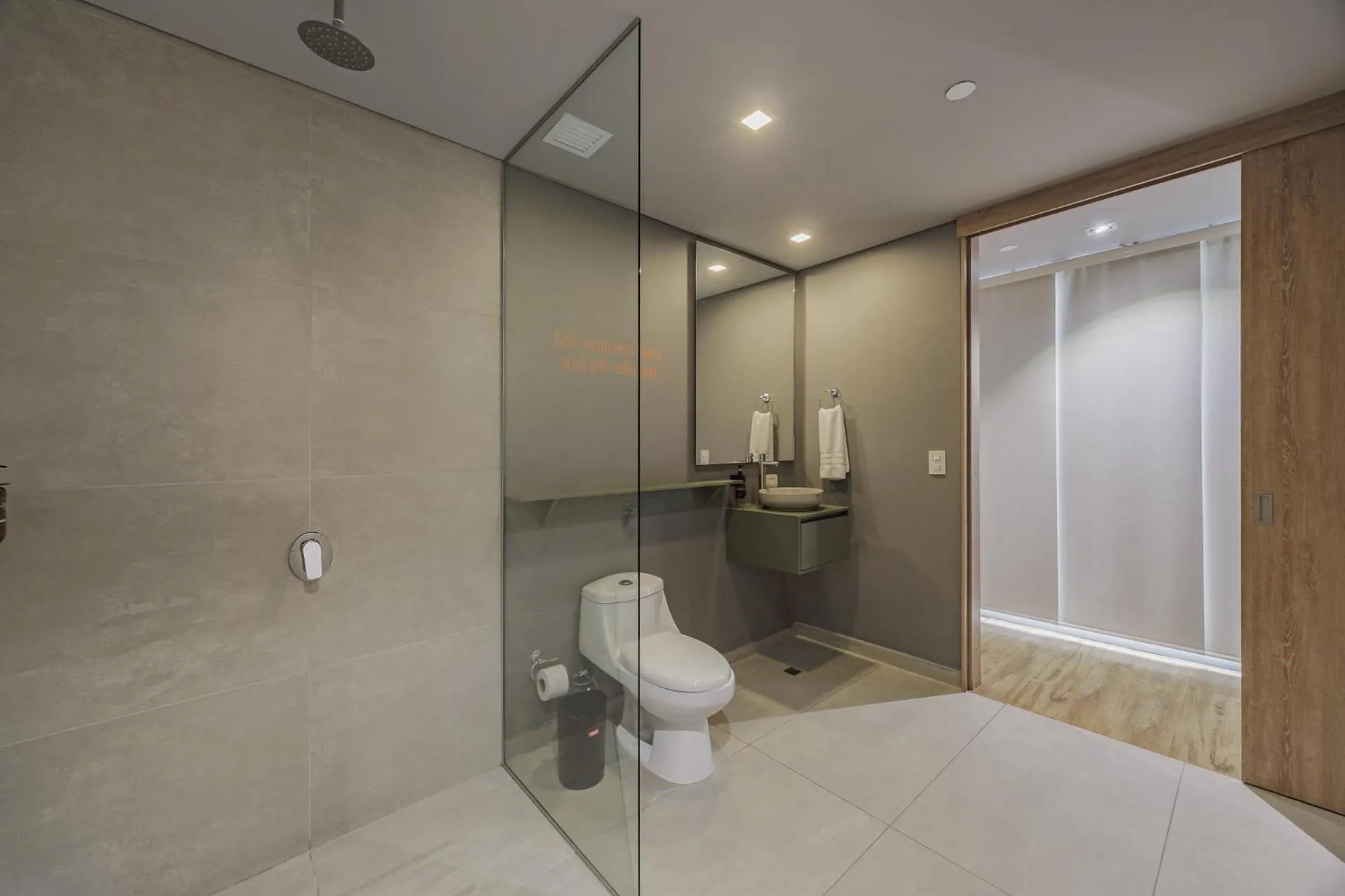 Bathroom in Versus Hotel