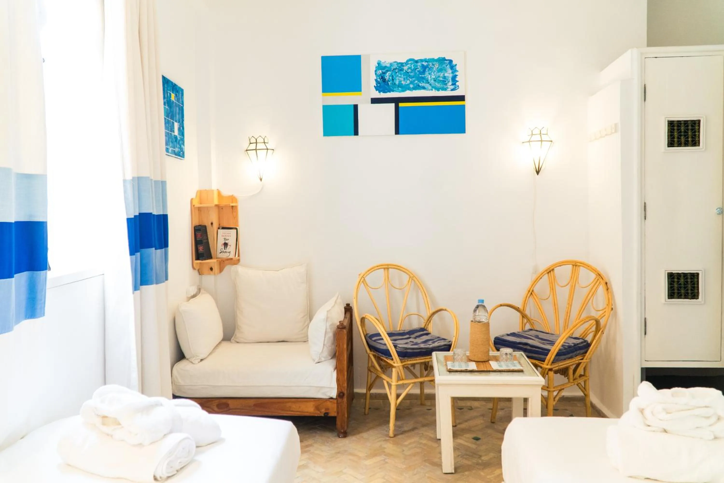 Seating area, Bed in Dar Liouba Hotel