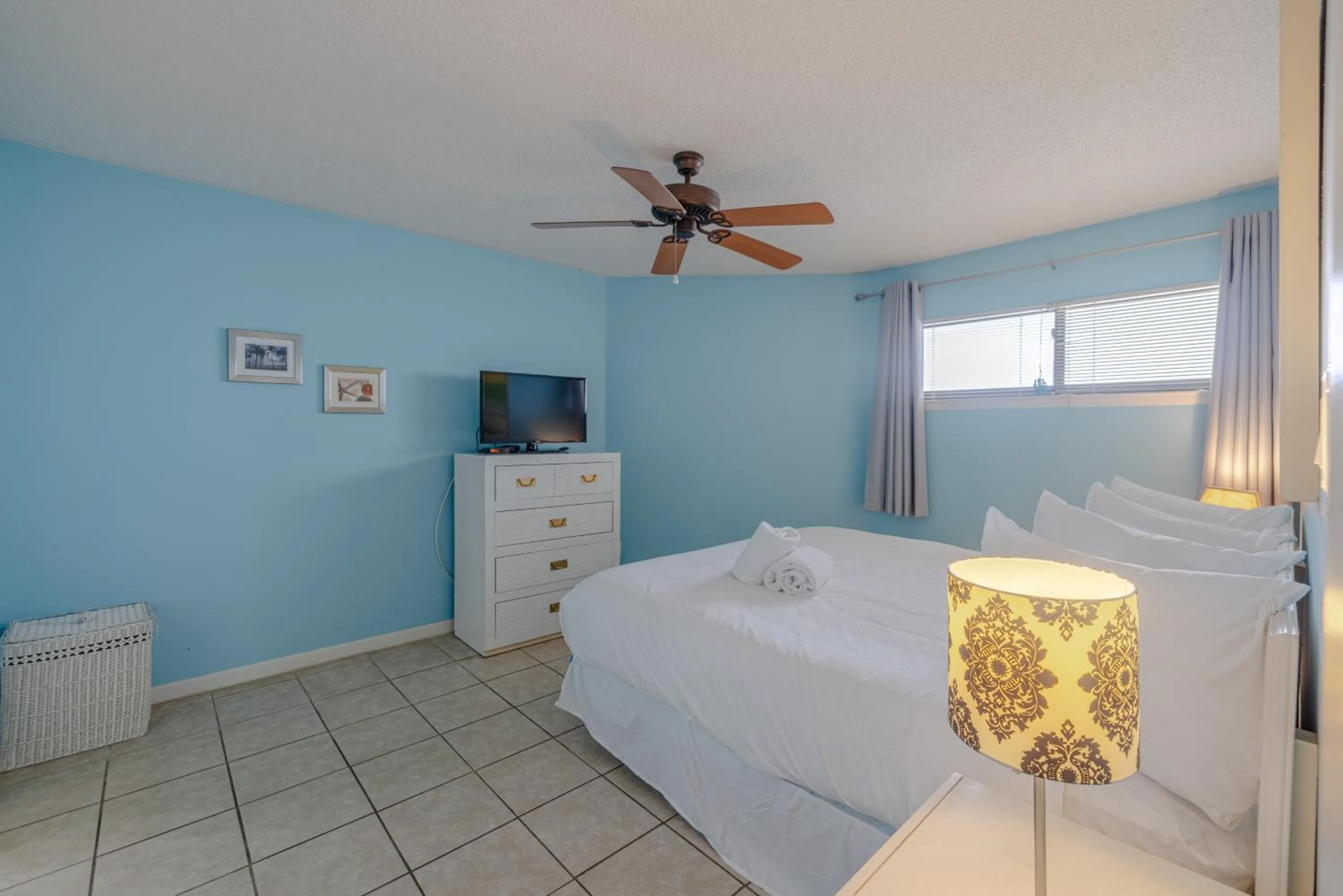 Bed in AquaVista Beach Resort by Sand Seeker Vacations