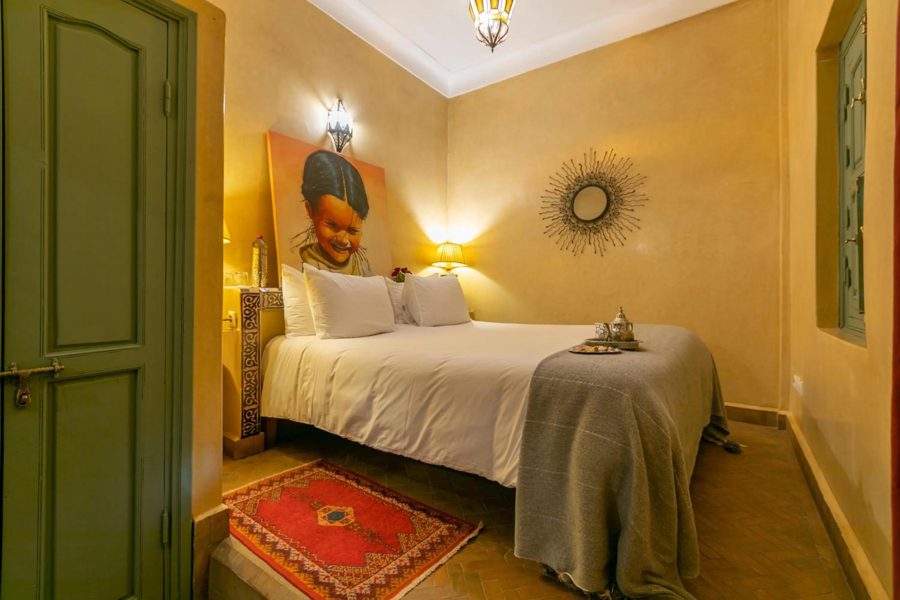 Bed in Riad Les Trois Palmiers El Bacha