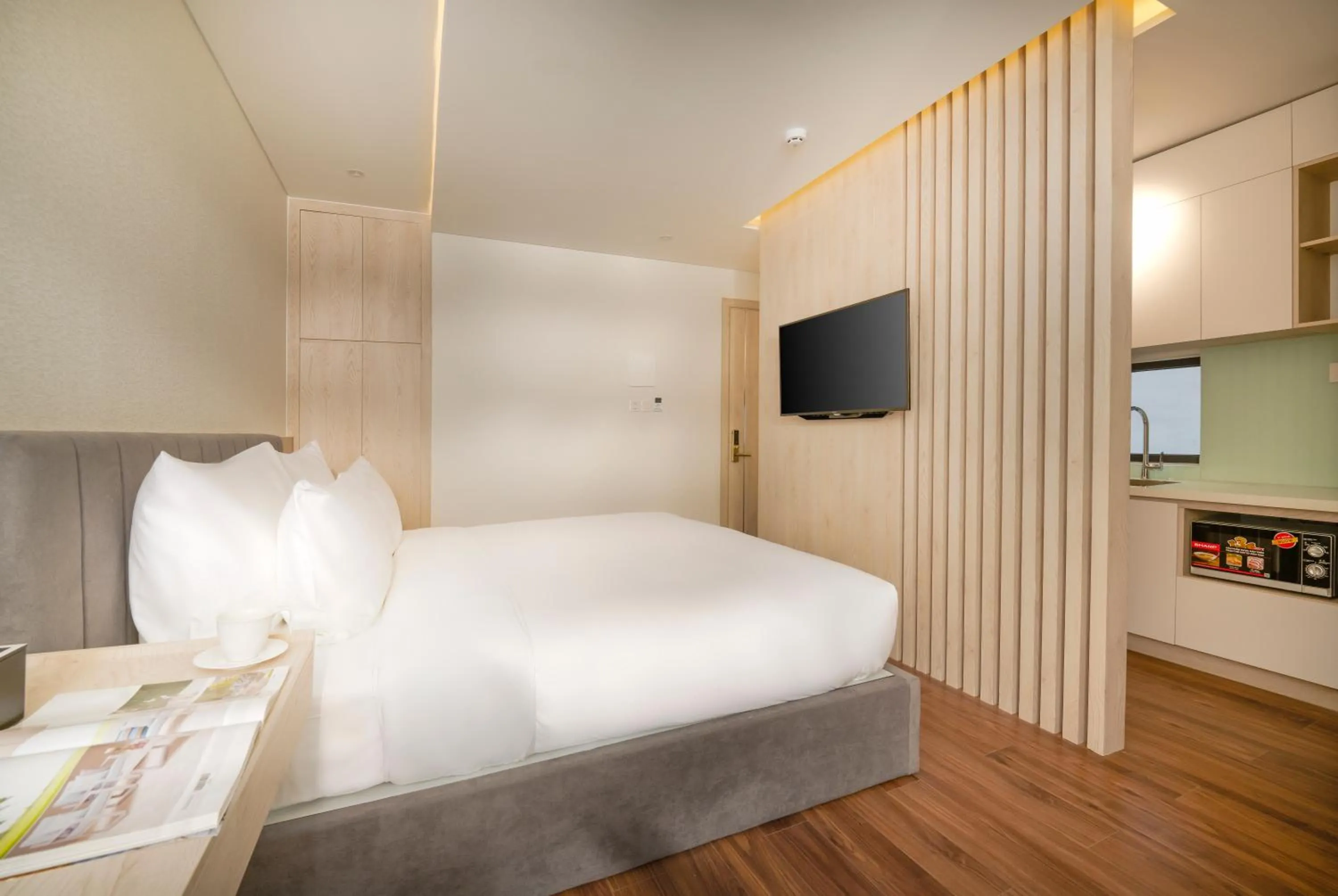 Bed in Tashi Ocean Garden & Apartment Da Nang - My Khe Beach