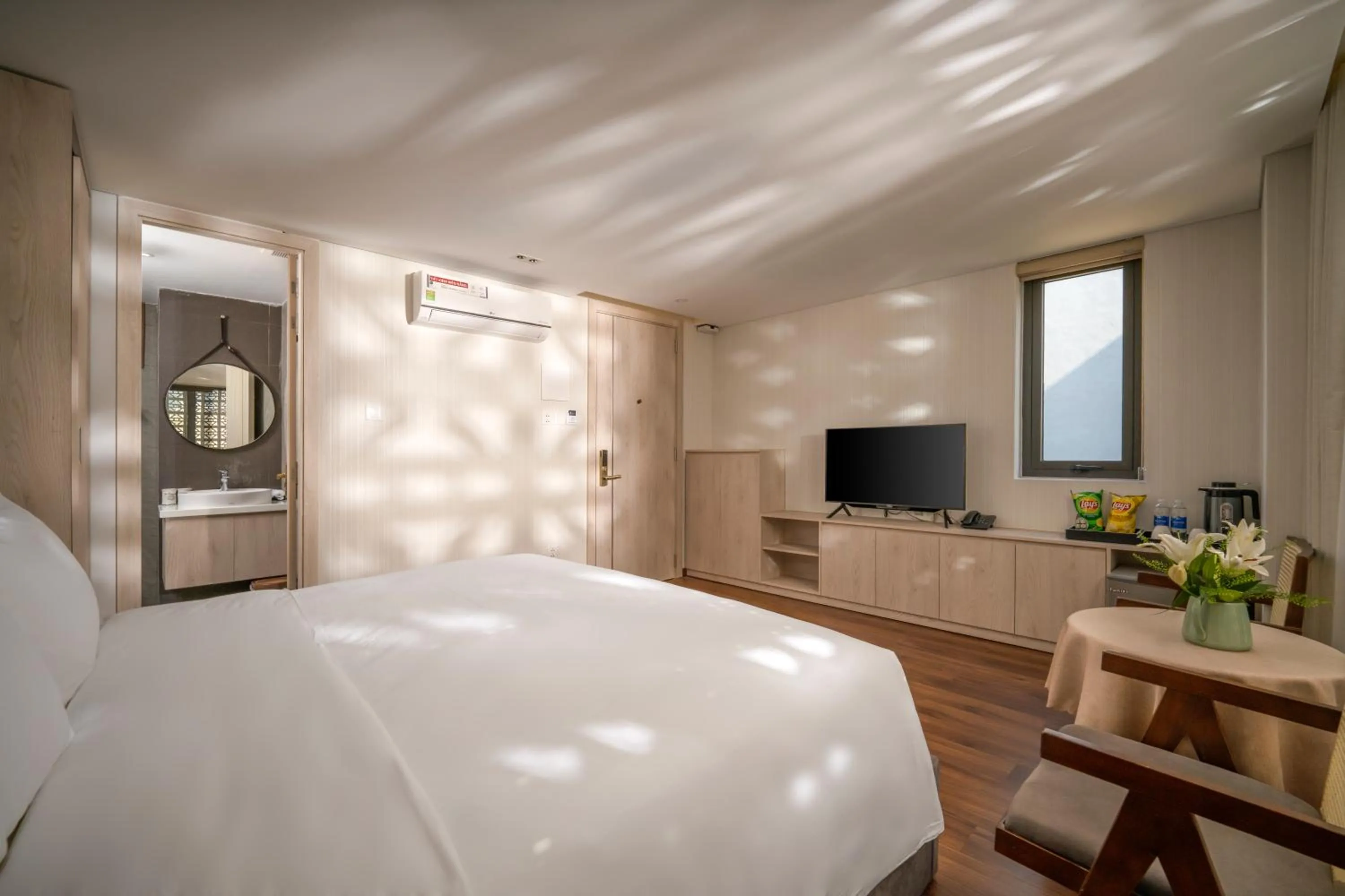 TV and multimedia, Bed in Tashi Ocean Garden & Apartment Da Nang - My Khe Beach