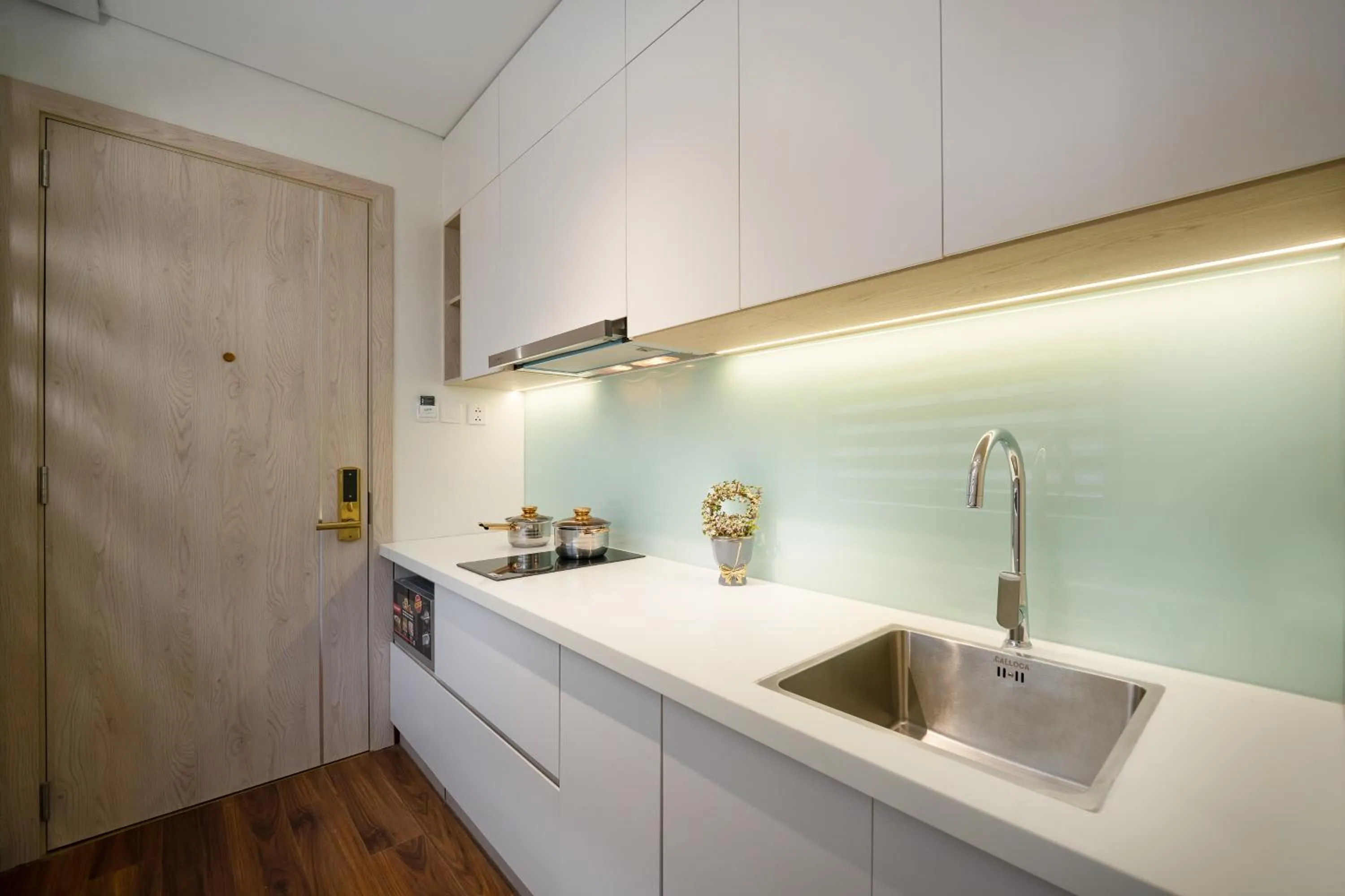 kitchen in Tashi Ocean Garden & Apartment Da Nang - My Khe Beach