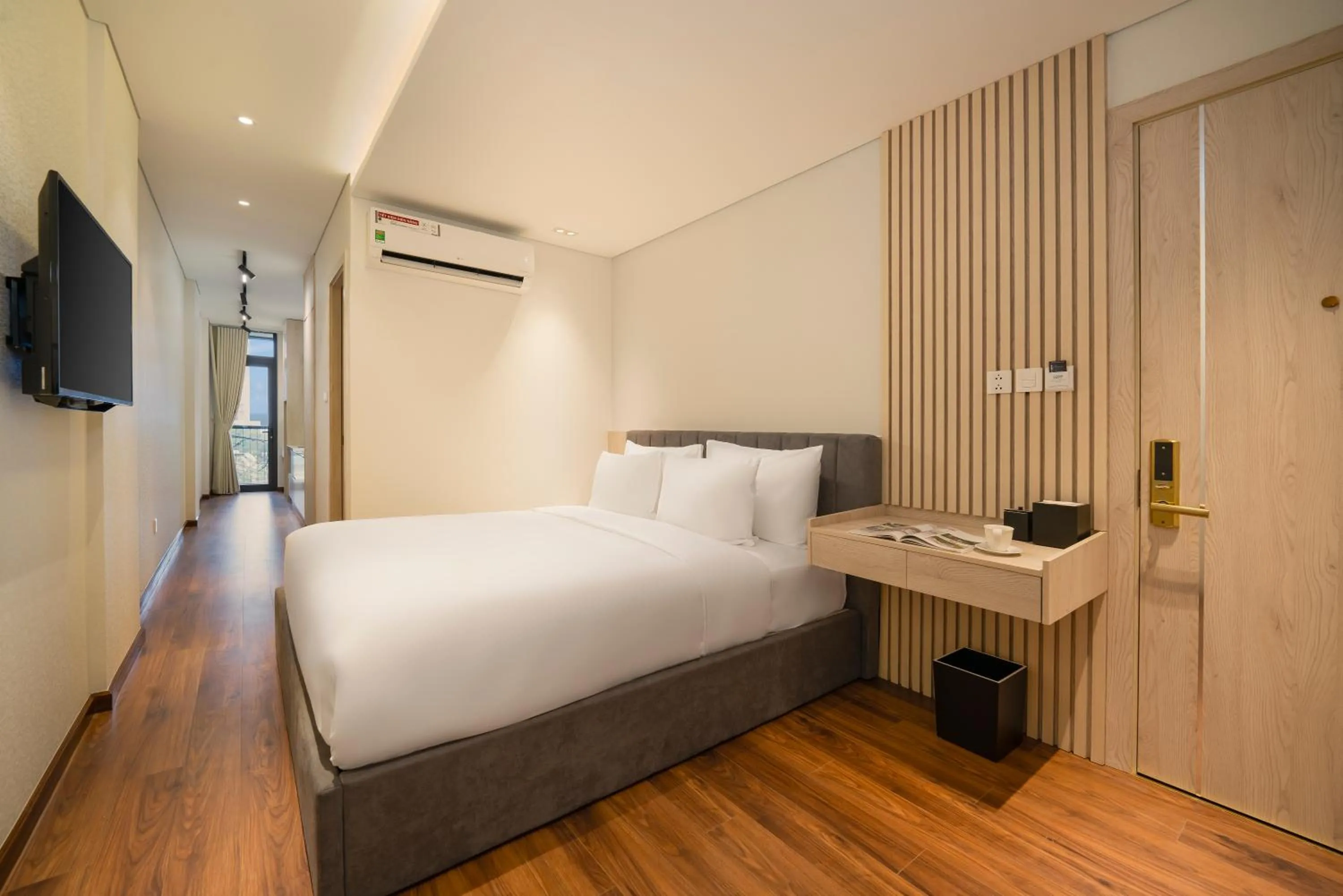 Bed in Tashi Ocean Garden & Apartment Da Nang - My Khe Beach