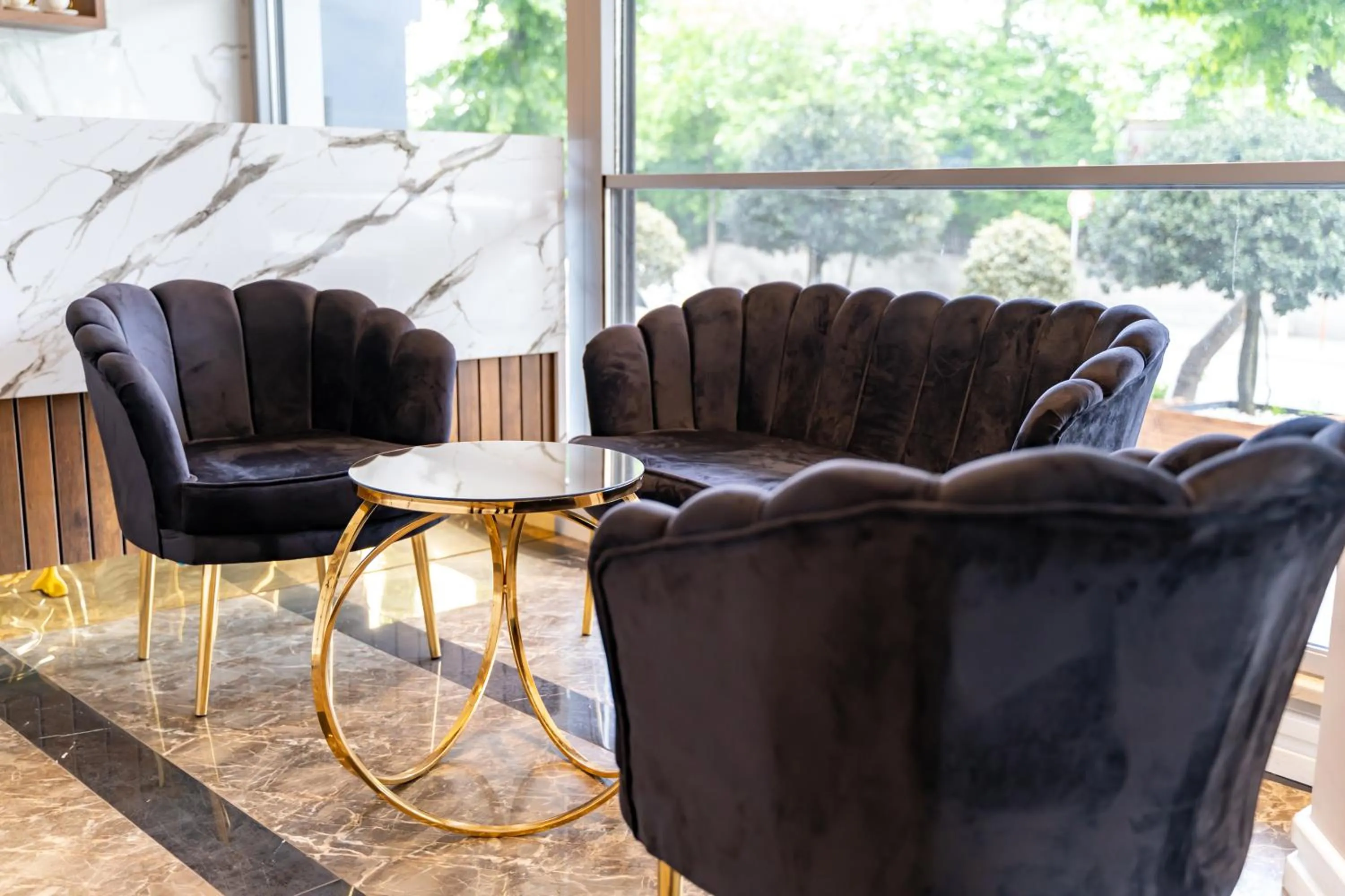 Lobby or reception in Garden Room Suit Hotel