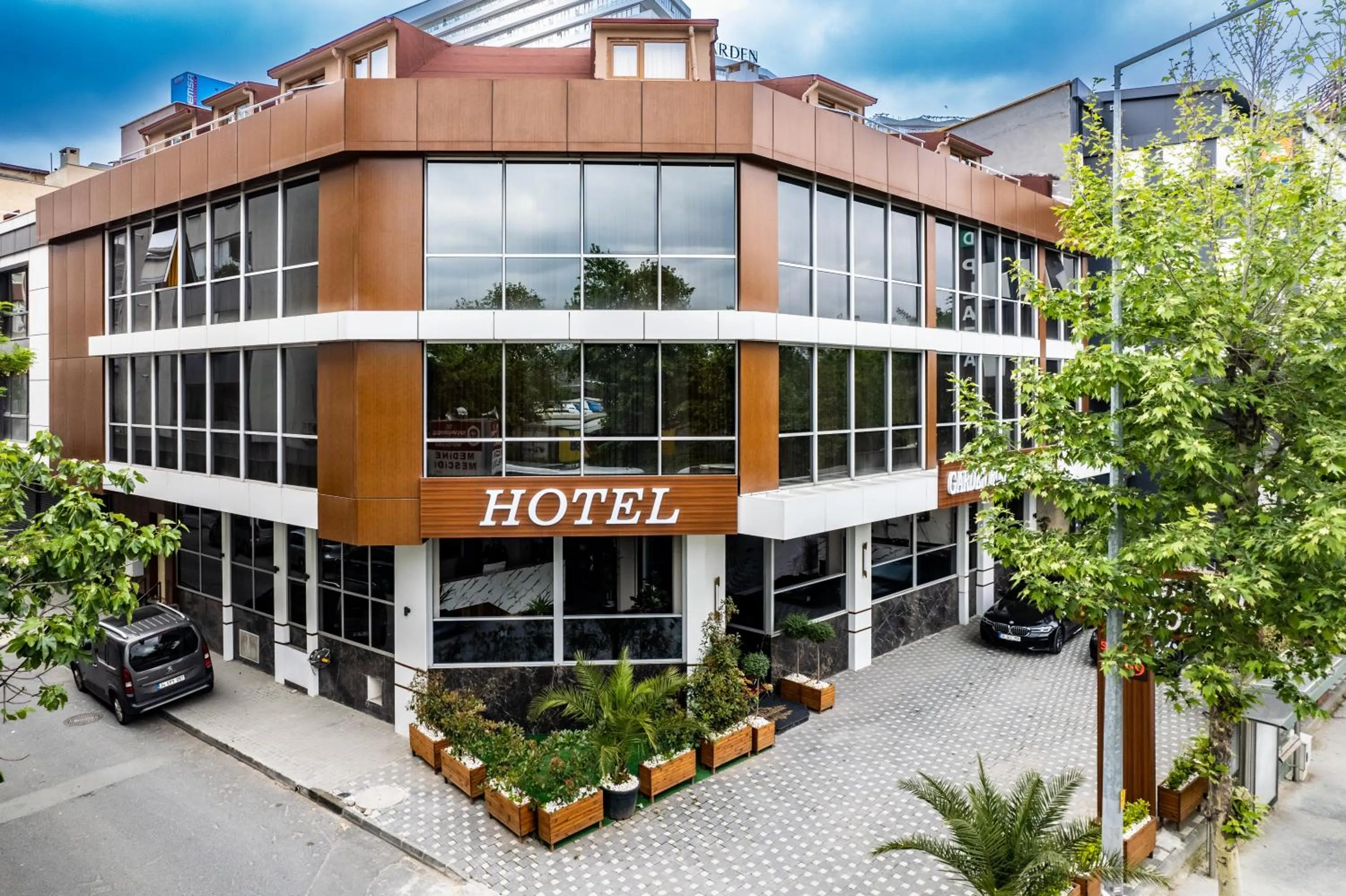 Property building in Garden Room Suit Hotel