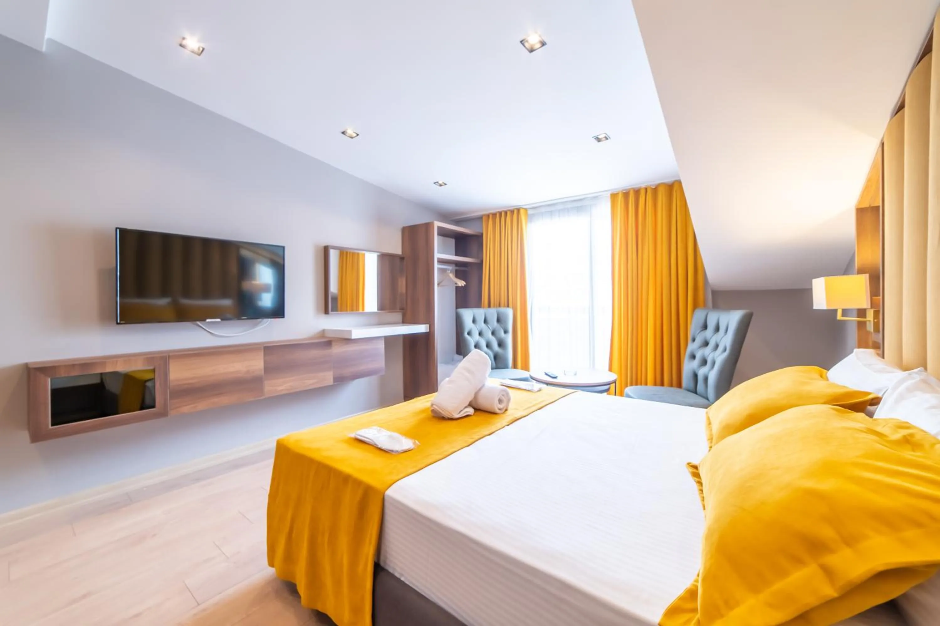 Bed in Garden Room Suit Hotel