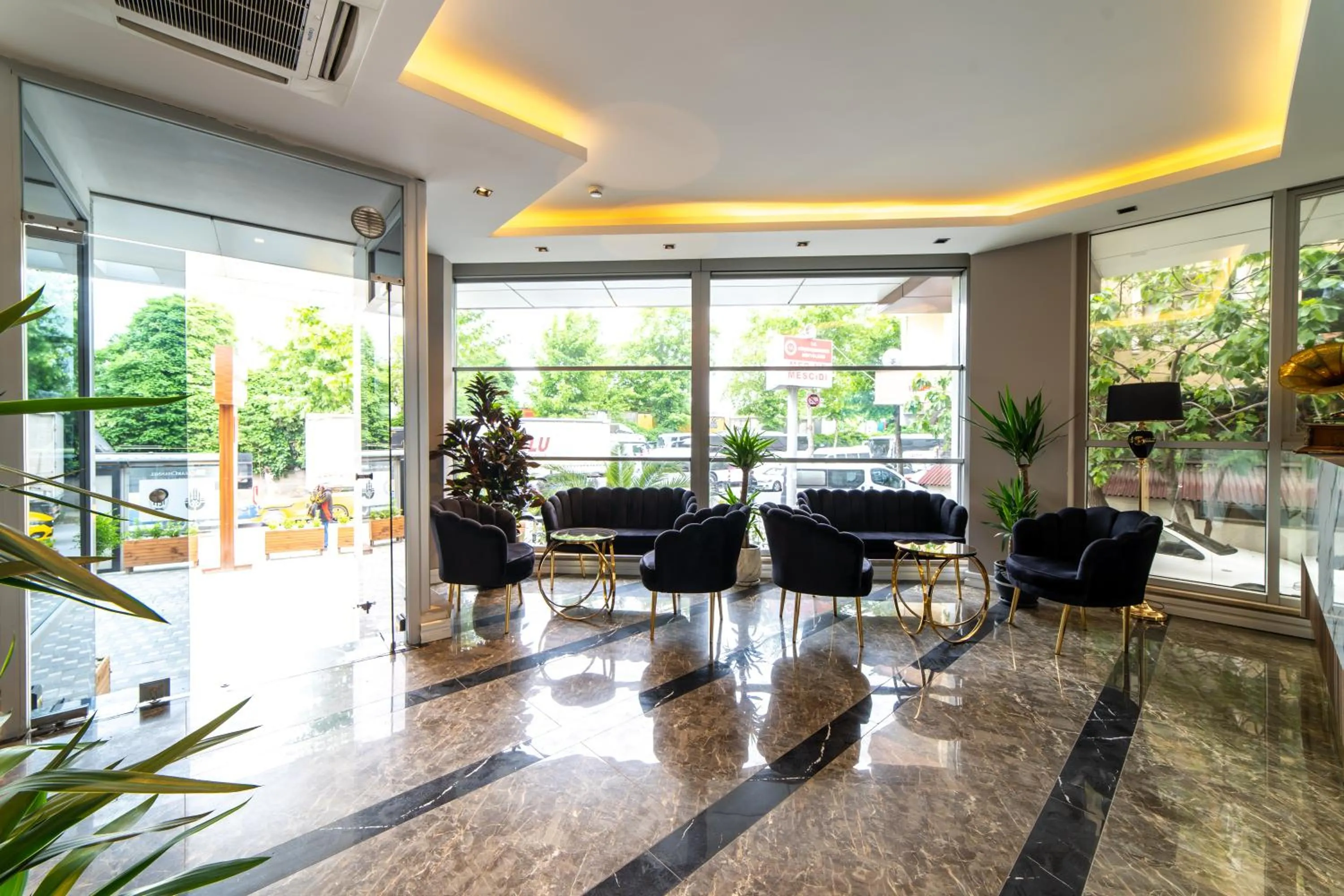 Lobby or reception in Garden Room Suit Hotel