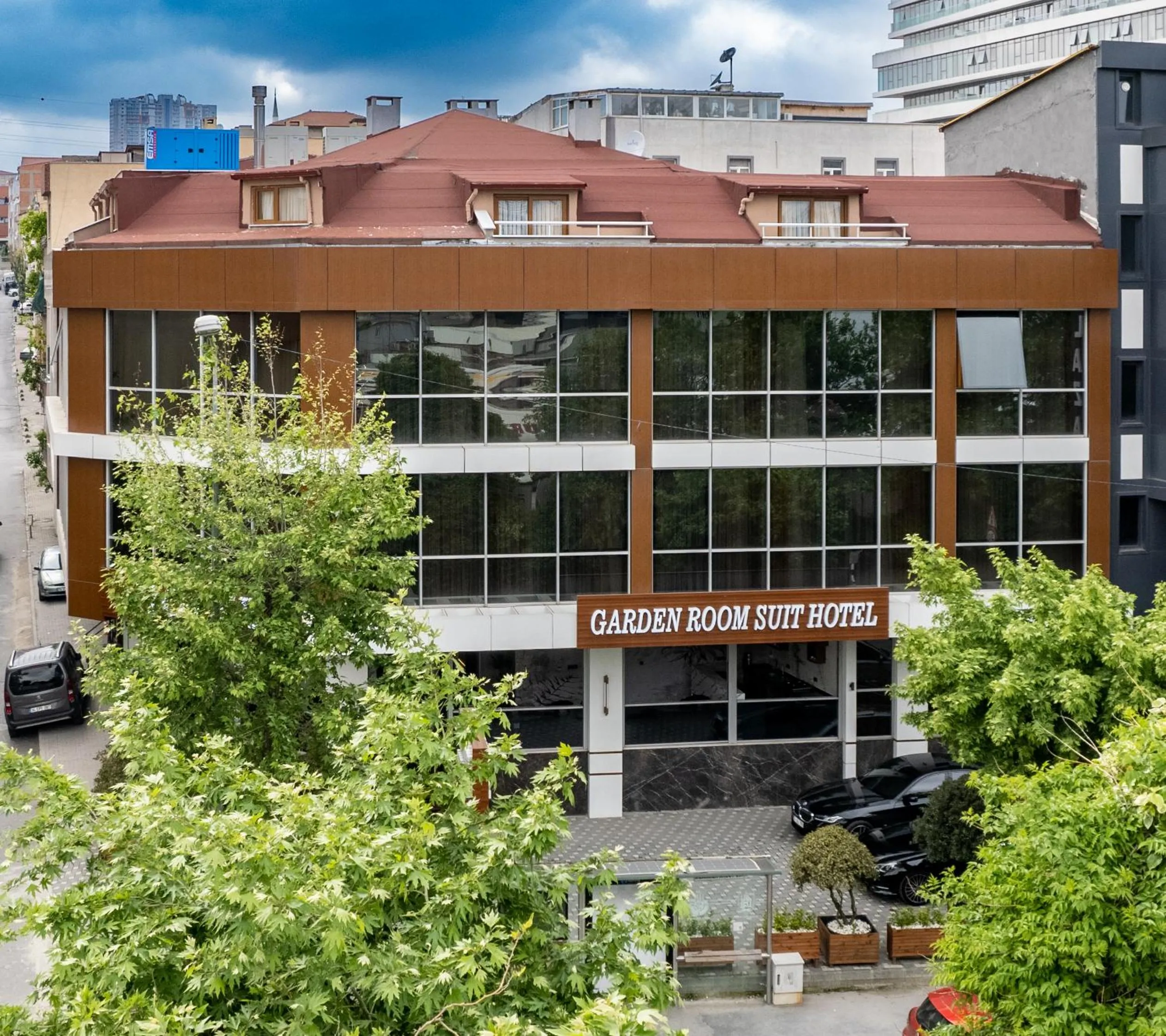 Property building in Garden Room Suit Hotel