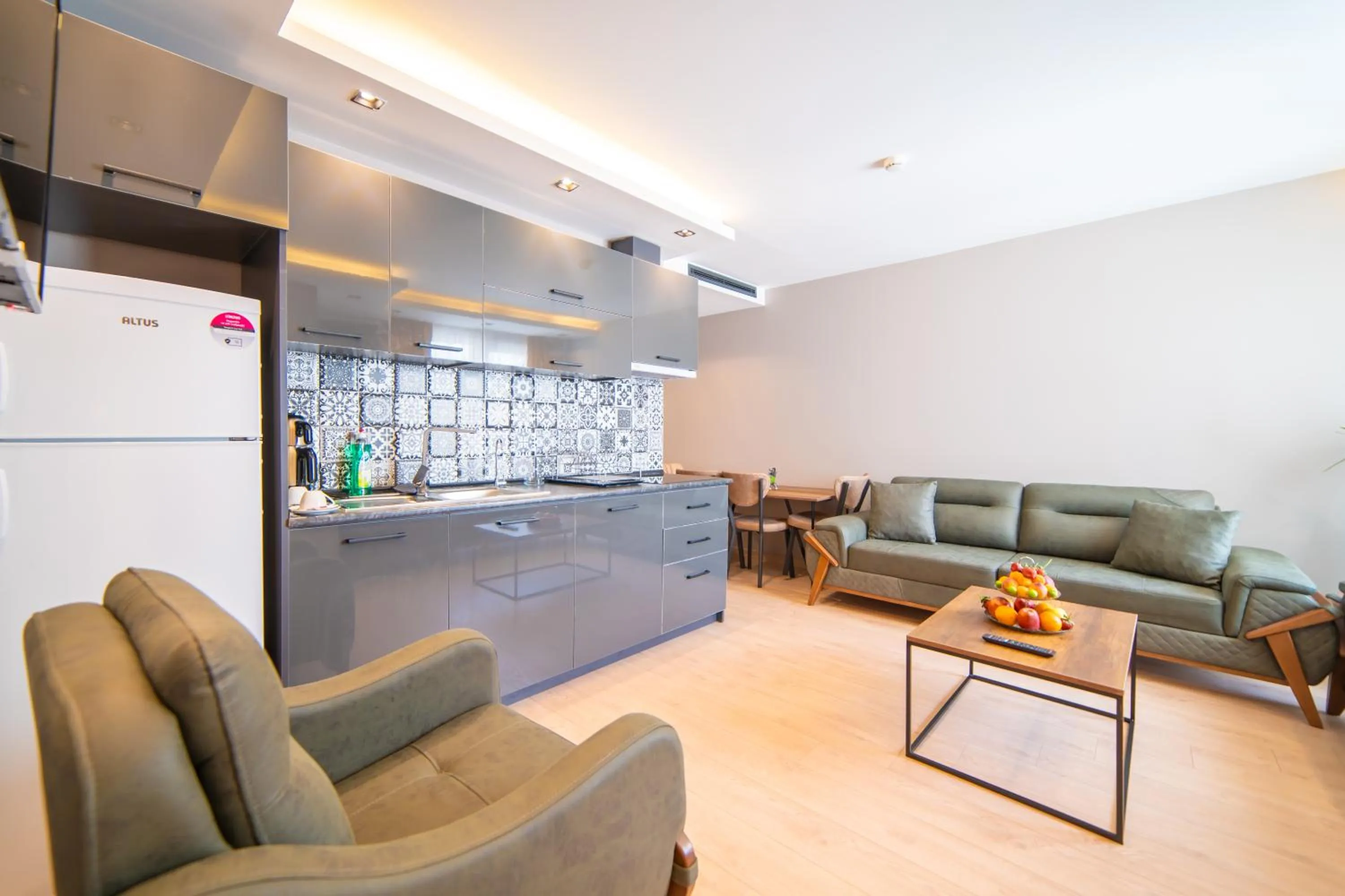 Living room in Garden Room Suit Hotel