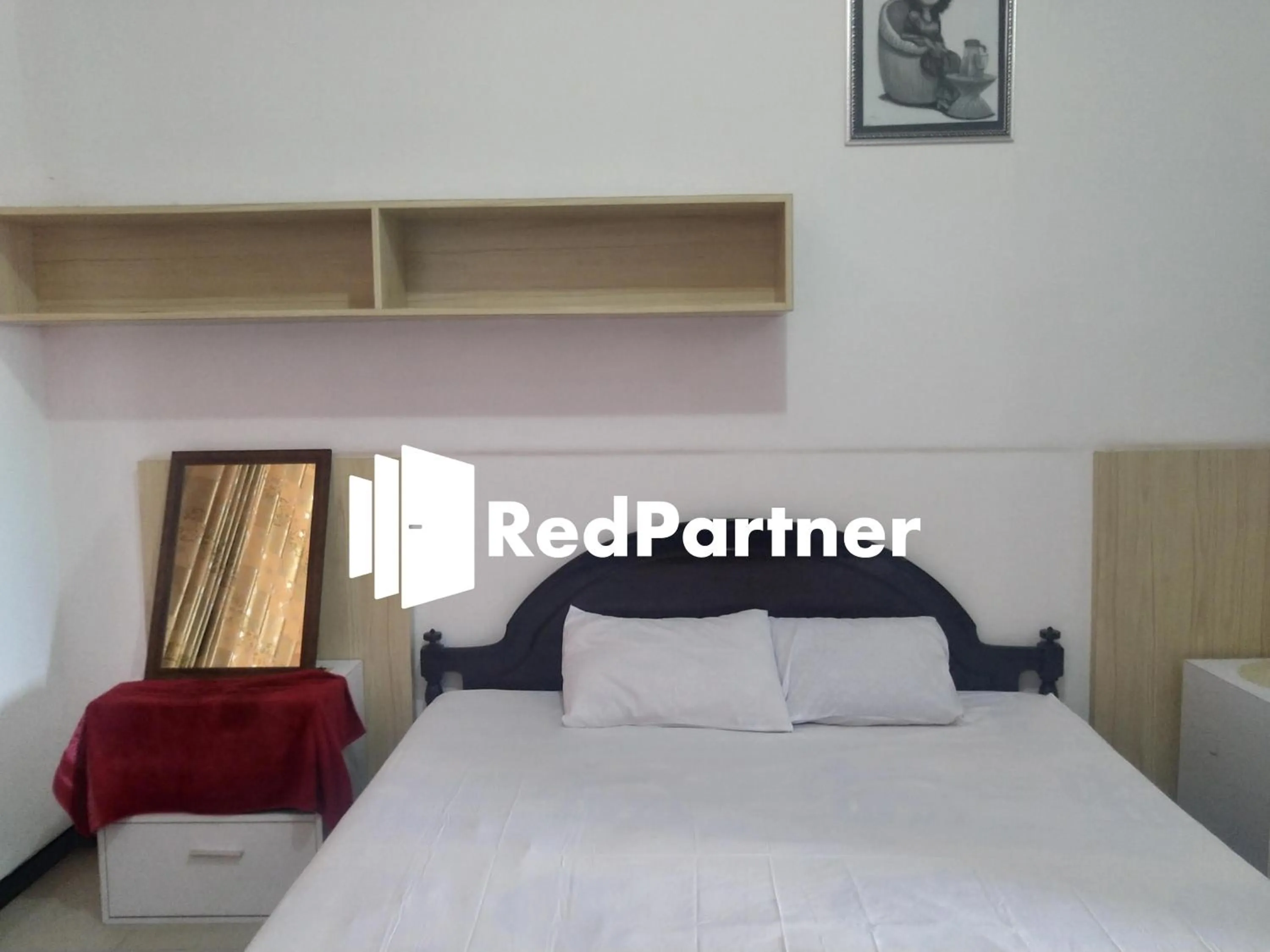 Bedroom in Riyani Residence At Jalan Ahmad Yani Pemalang Mitra RedDoorz