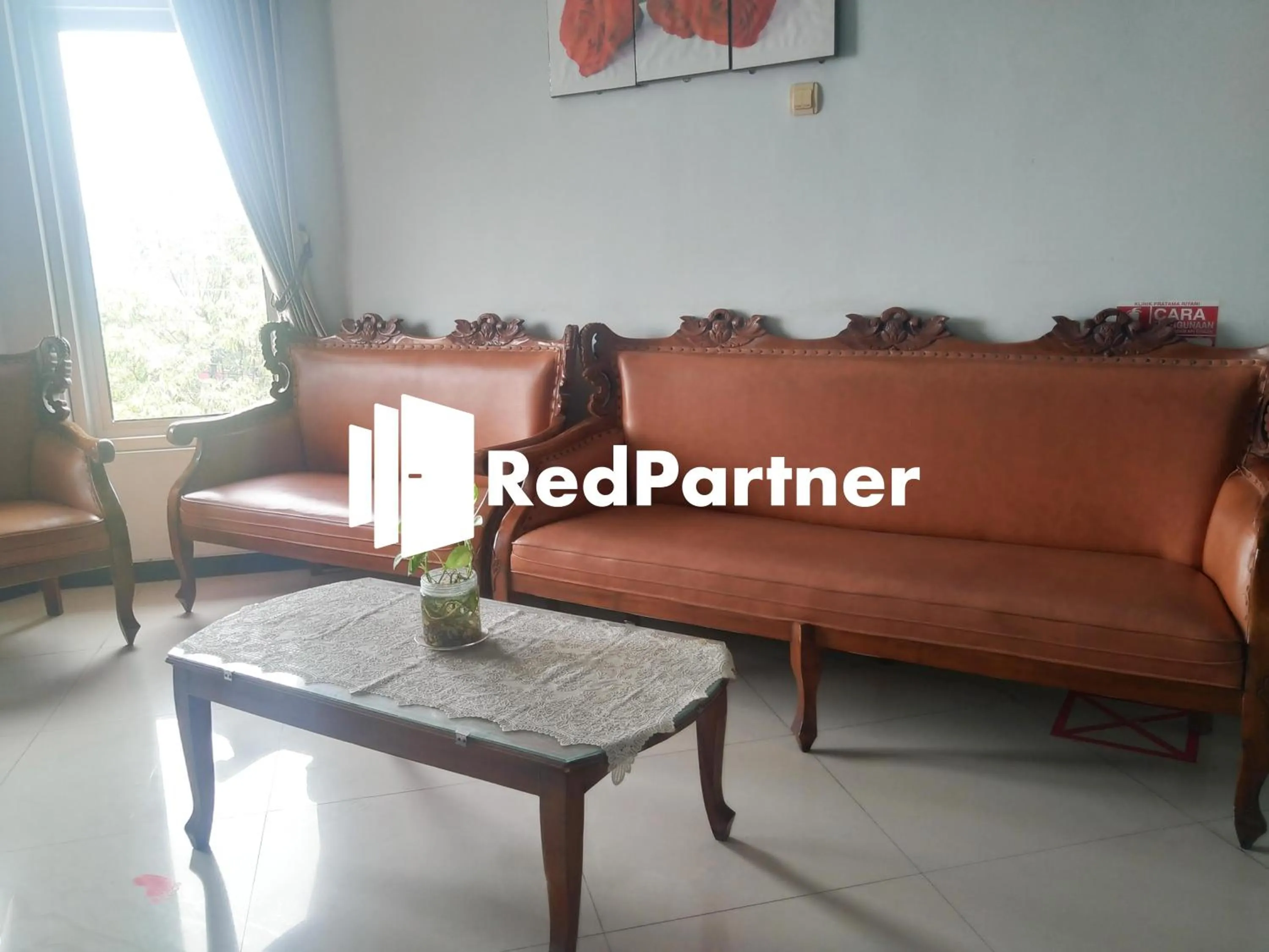 Seating area in Riyani Residence At Jalan Ahmad Yani Pemalang Mitra RedDoorz