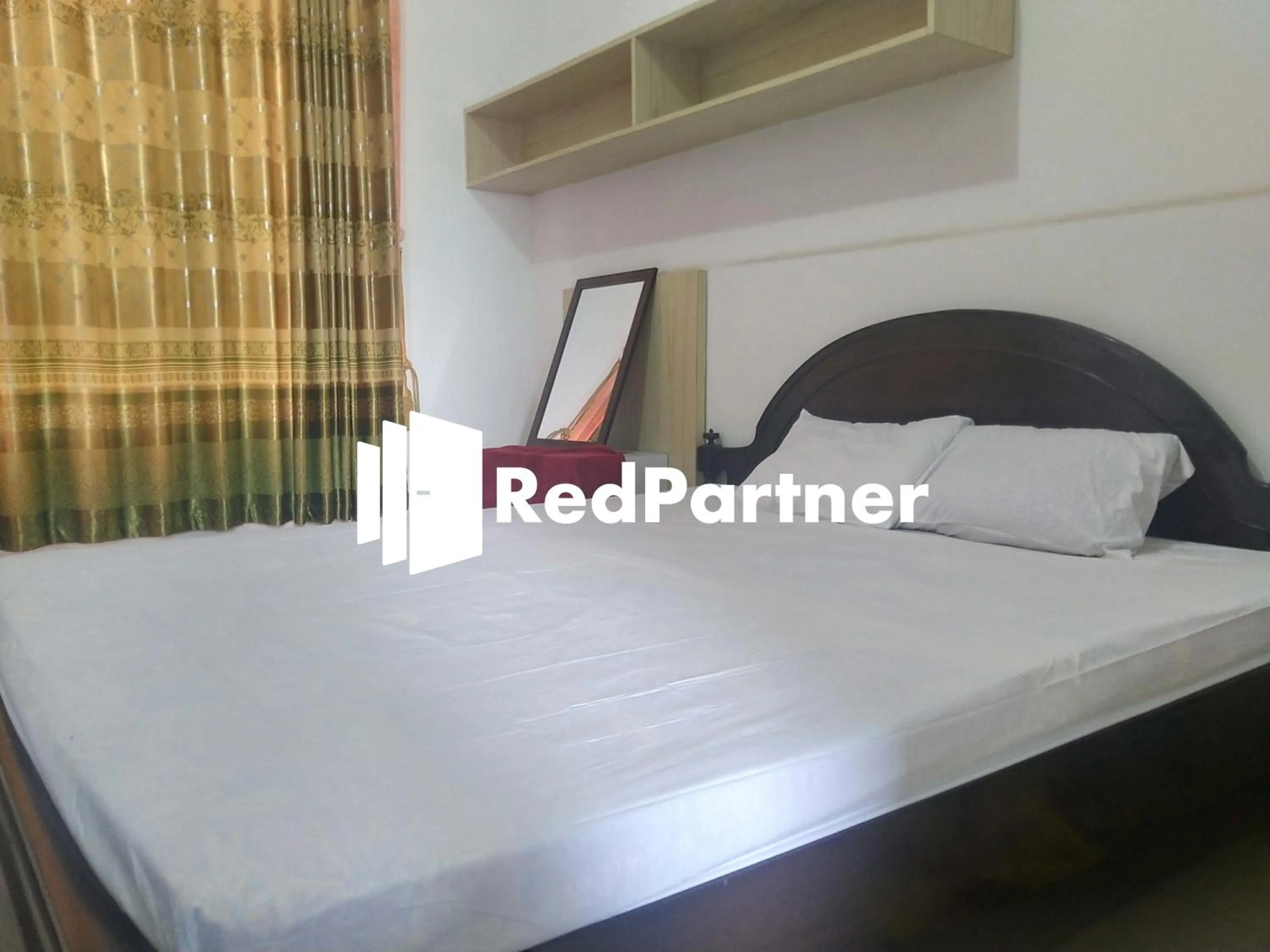 Bedroom in Riyani Residence At Jalan Ahmad Yani Pemalang Mitra RedDoorz