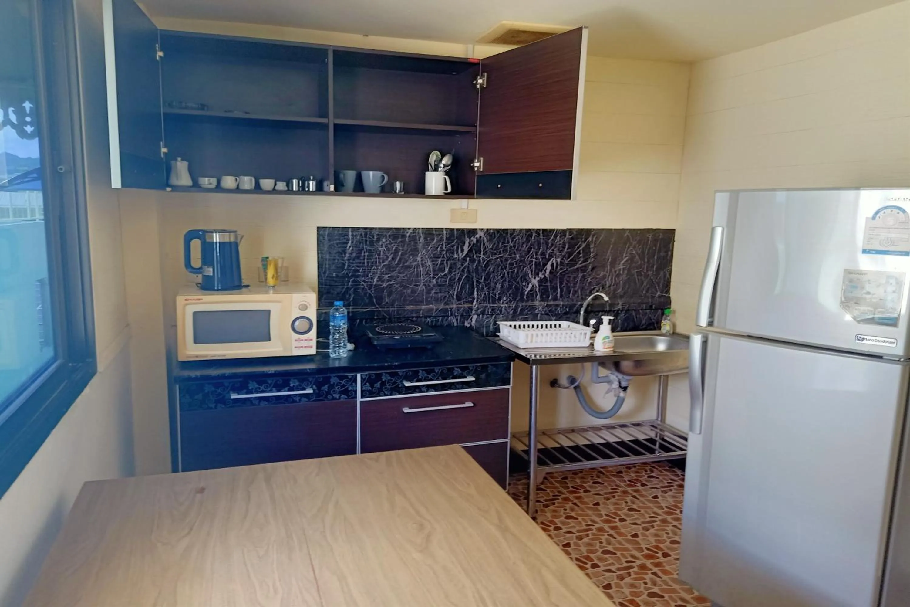 Kitchen or kitchenette in Sonya Residence