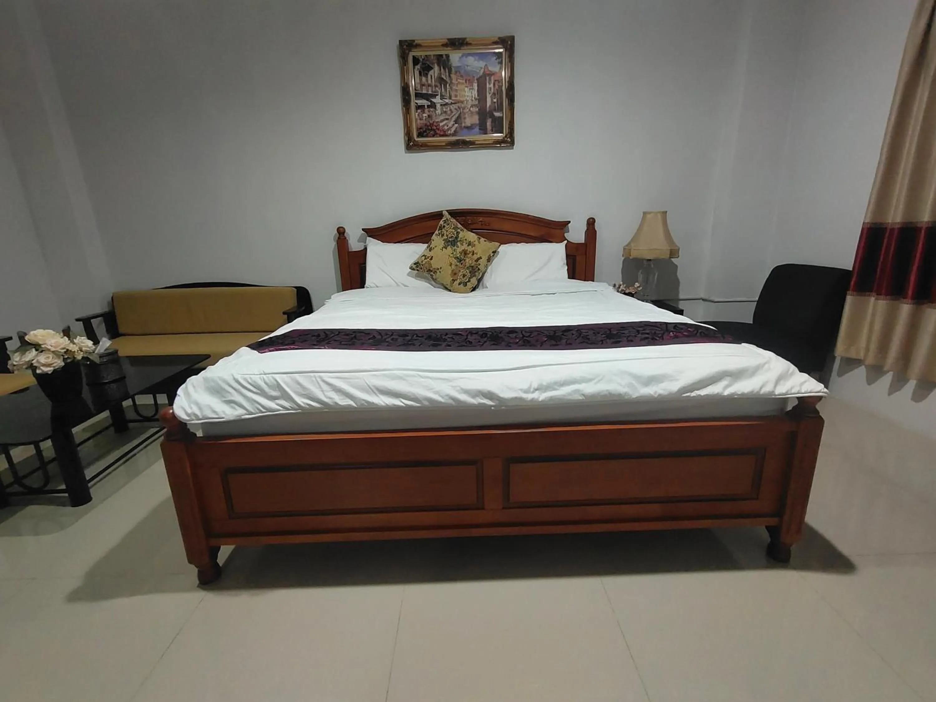 Bed in ห้องพักนครราชสีมา The Rich Room