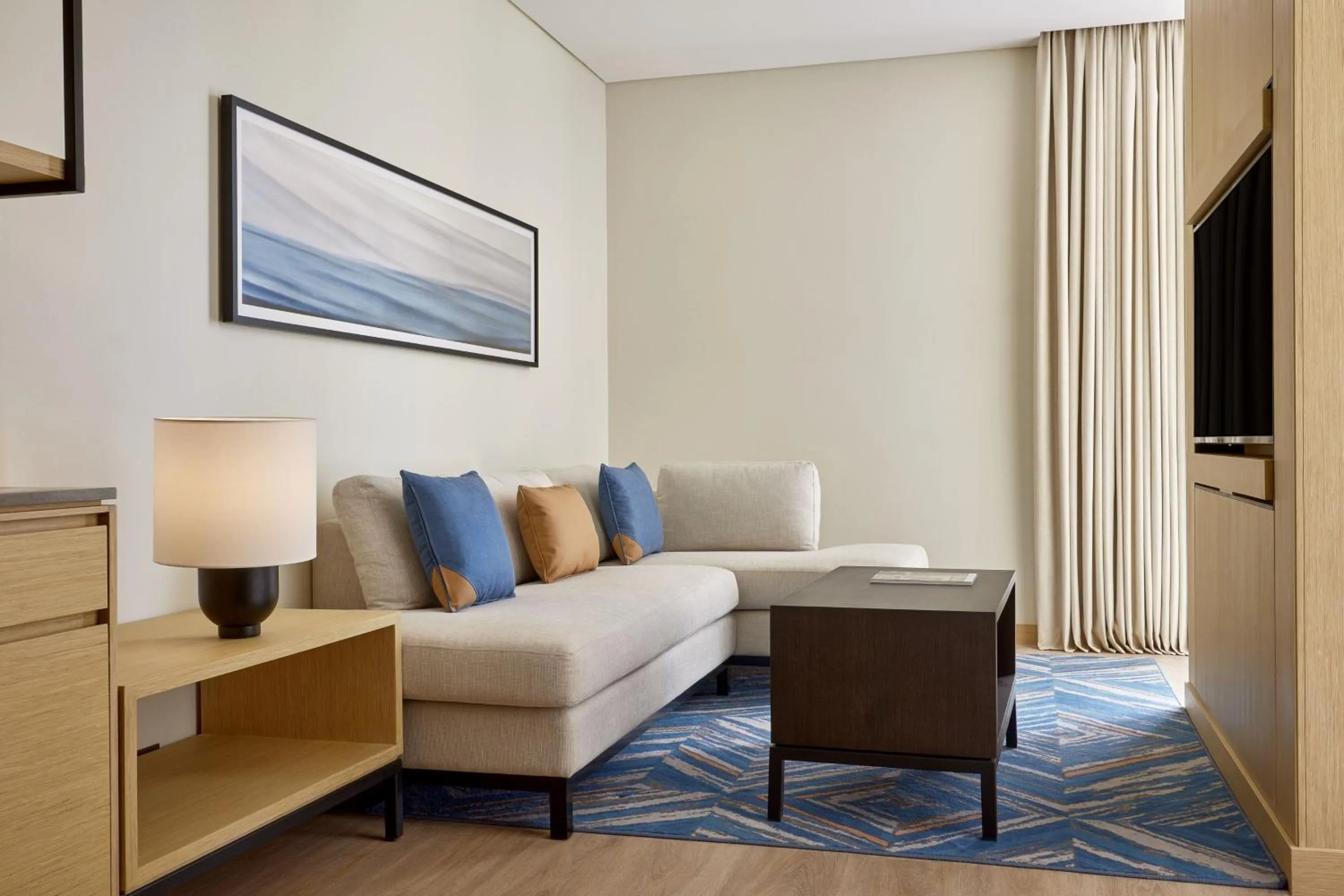 Living room in Courtyard by Marriott Jubail