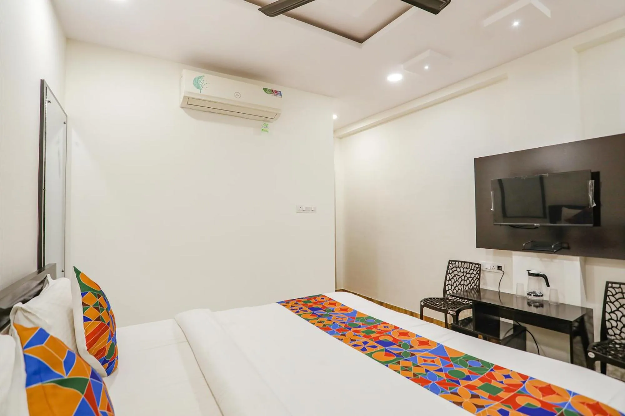 Bed in FabHotel Royal Stay - Beltarodi