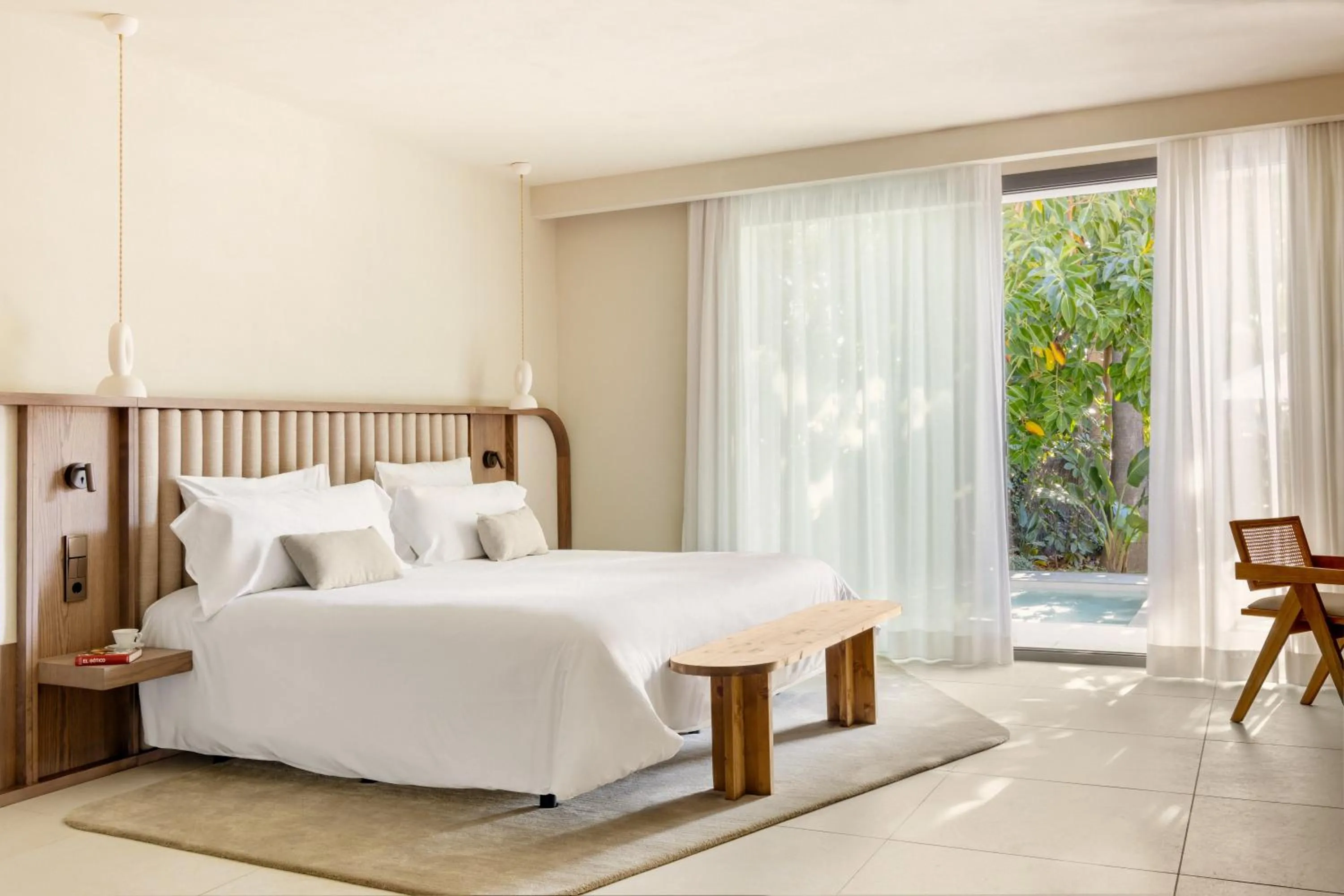 Bed in Anfitrión Villas & Suites