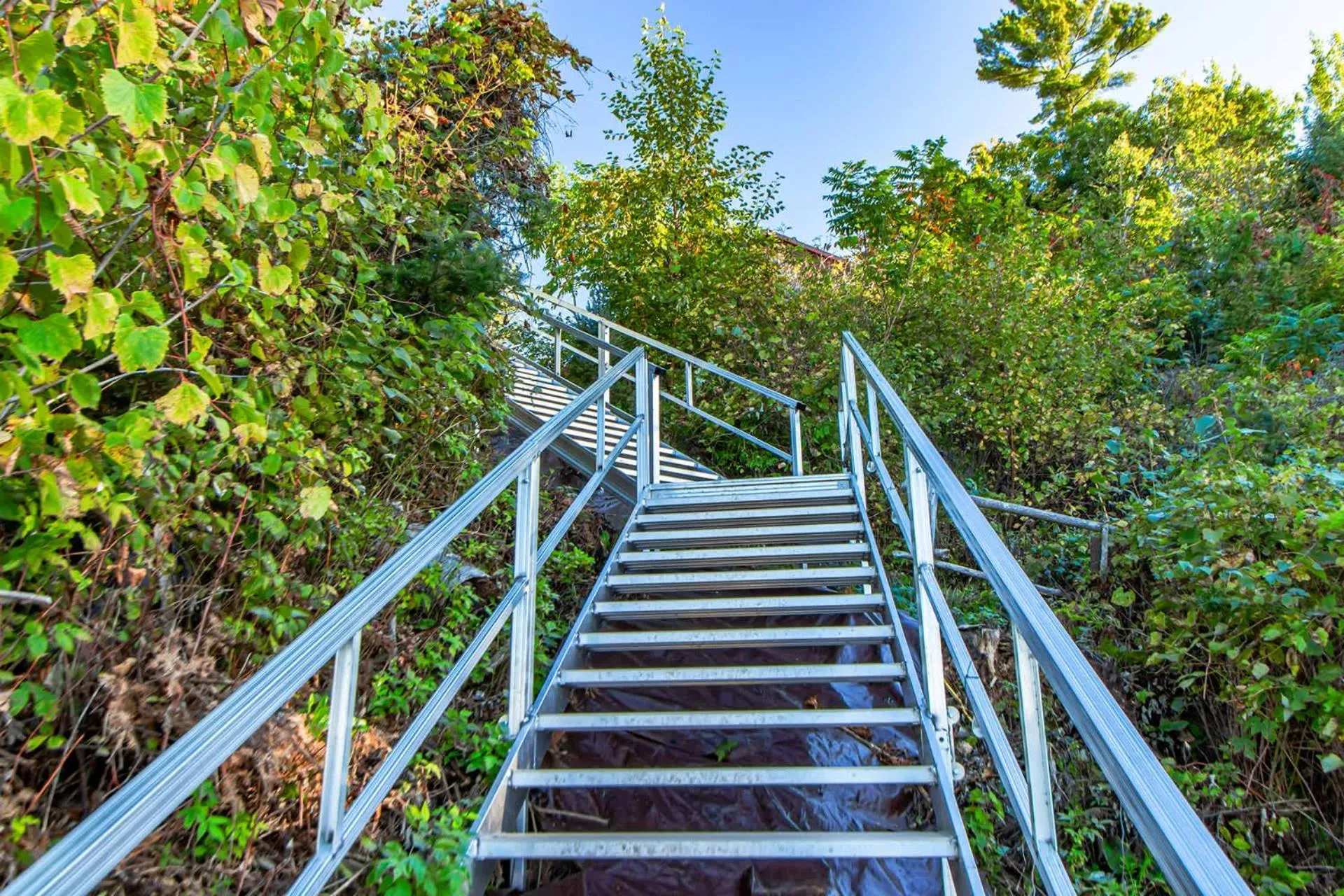 Spacious Leech Lake Home on 2 Private Acres, 200' of lake shore 15 Minutes to Walker with boat lift, dock, swimming, fire pit