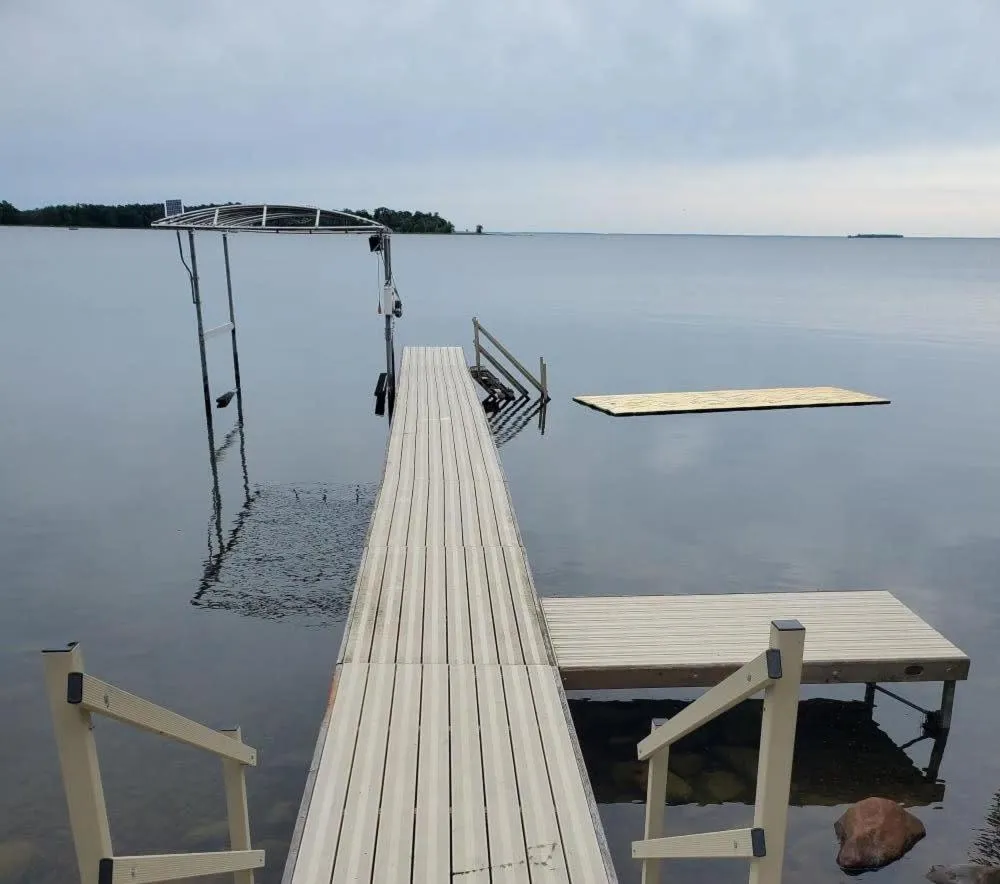 Lake view in Spacious Leech Lake Home on 2 Private Acres, 200' of lake shore 15 Minutes to Walker with boat lift, dock, swimming, fire pit
