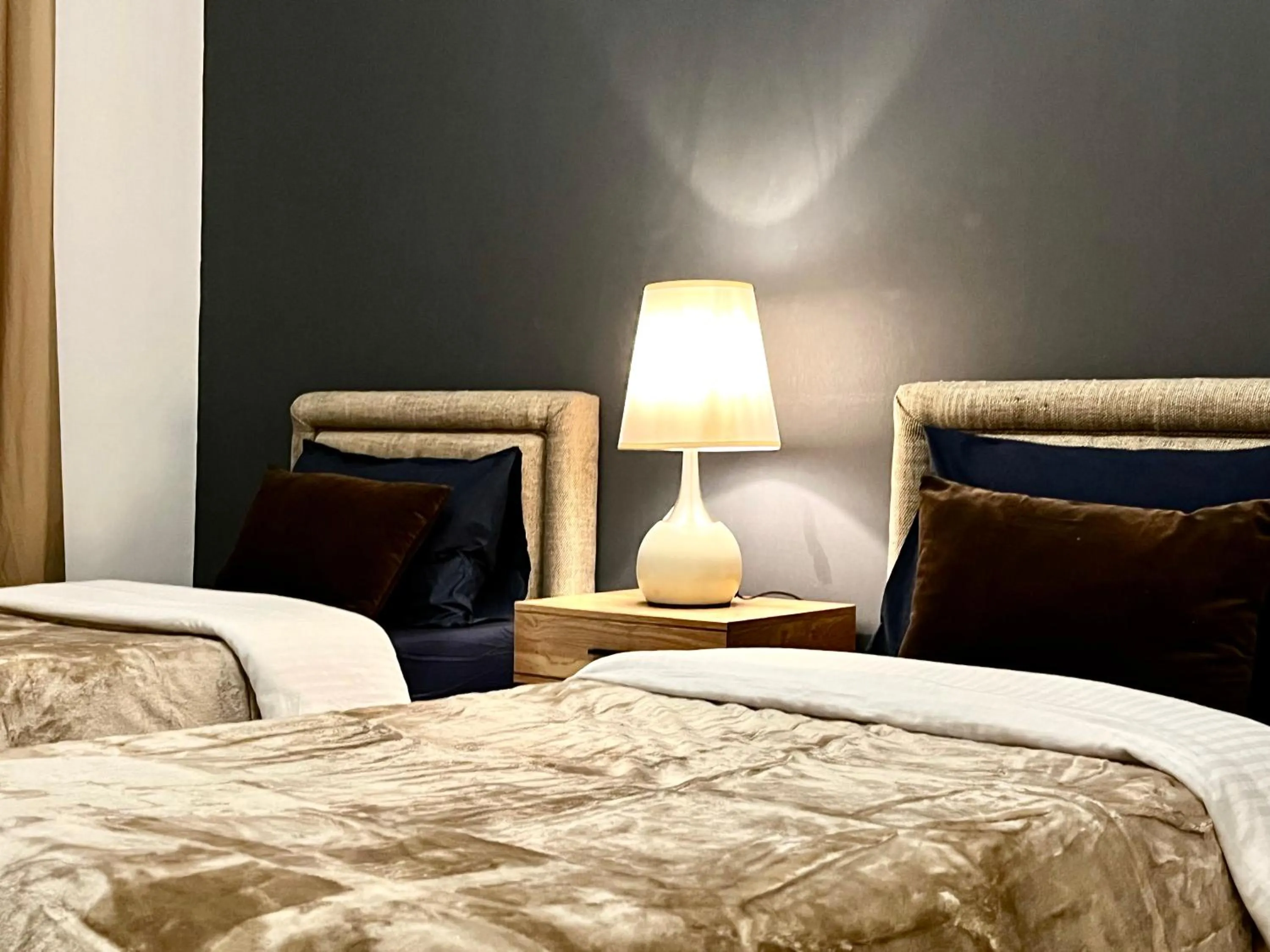 Bed in Chic 3 bedroom apartment